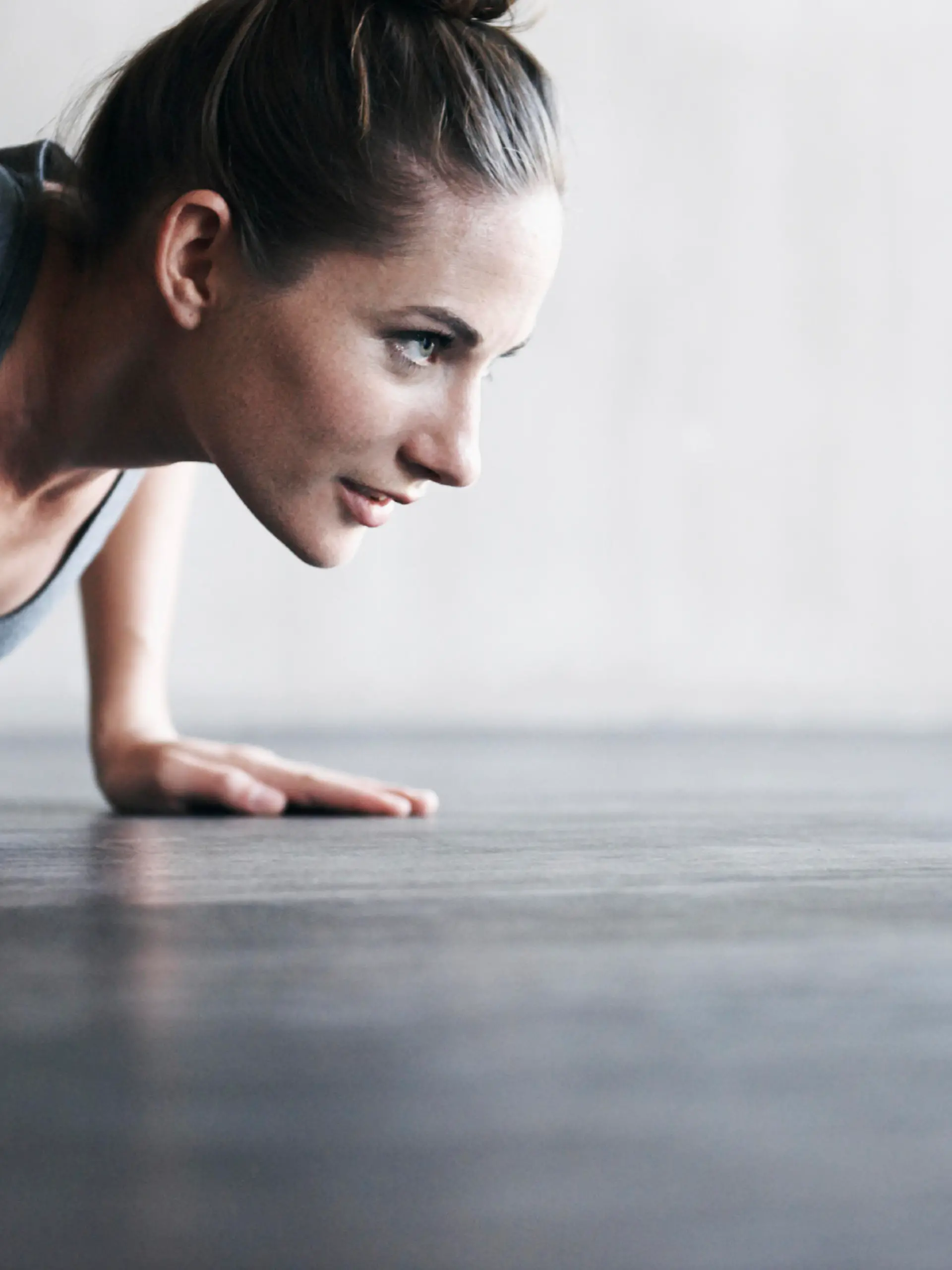 Shot of an attractive young woman working out at the gym