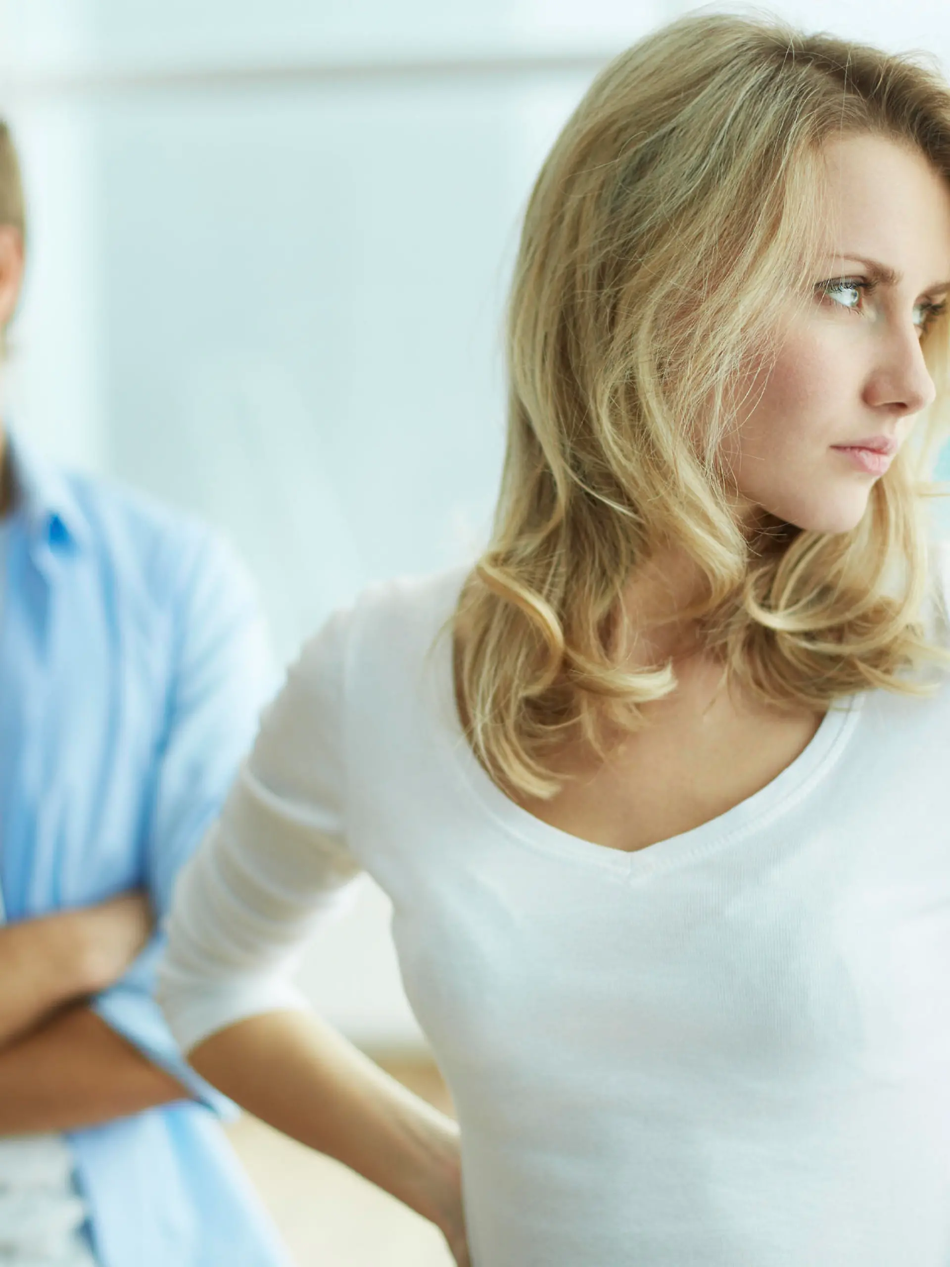 Image of young upset female in quarrel with her husband
