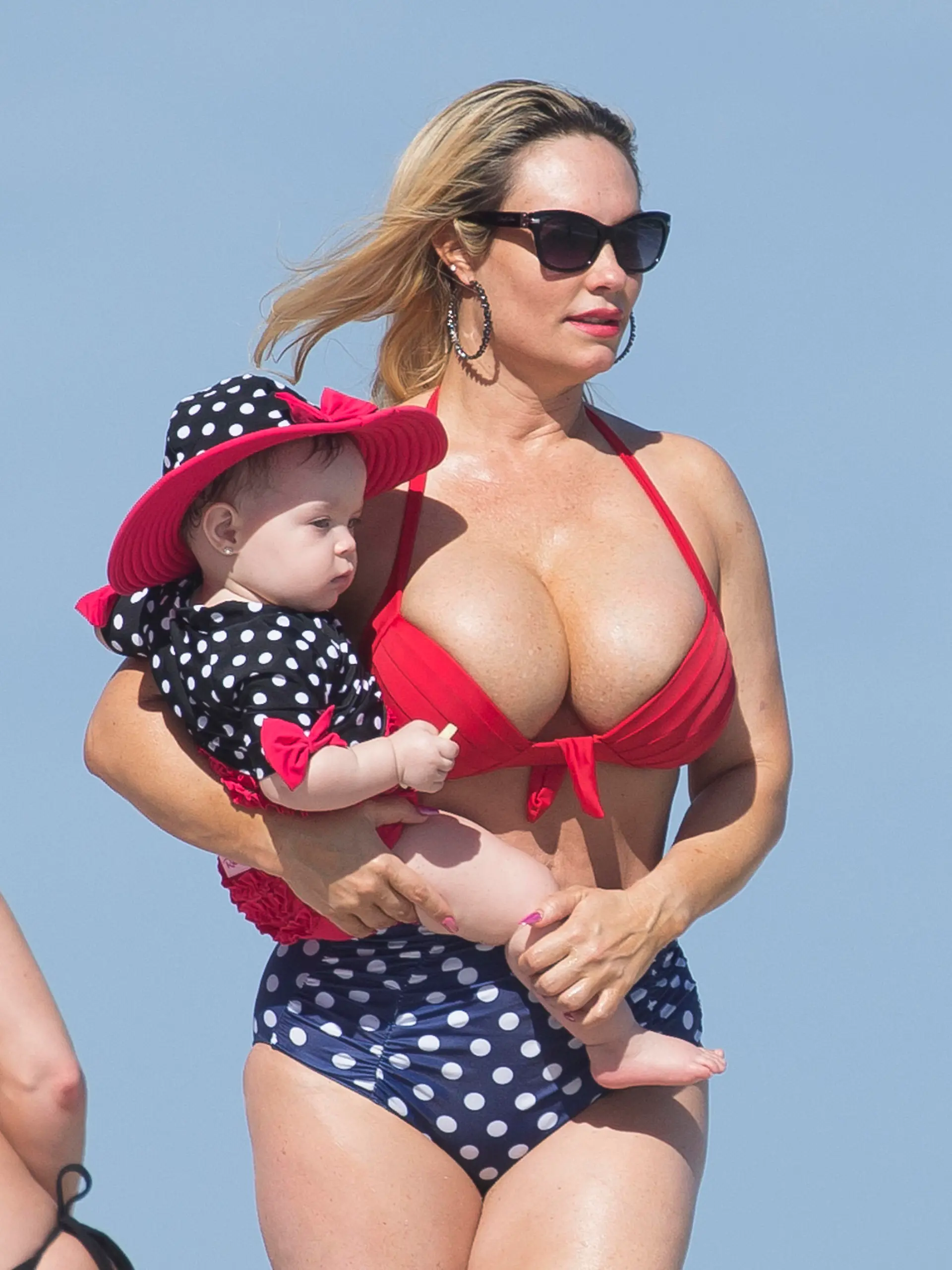 Coco Austin shows off her bikini body on the beach in Miami while playing with baby Chanel on vacation with husband Ice T. 
<P>

<B>Ref: SPL1422756  170117  </B><BR/>
Picture by: Splash News<BR/>
</P><P>
<B>Splash News and Pictures</B><BR/>
Los Angeles:	310-821-2666<BR/>
New York:	212-619-2666<BR/>
London:	870-934-2666<BR/>
photodesk@splashnews.com<BR/>
</P>