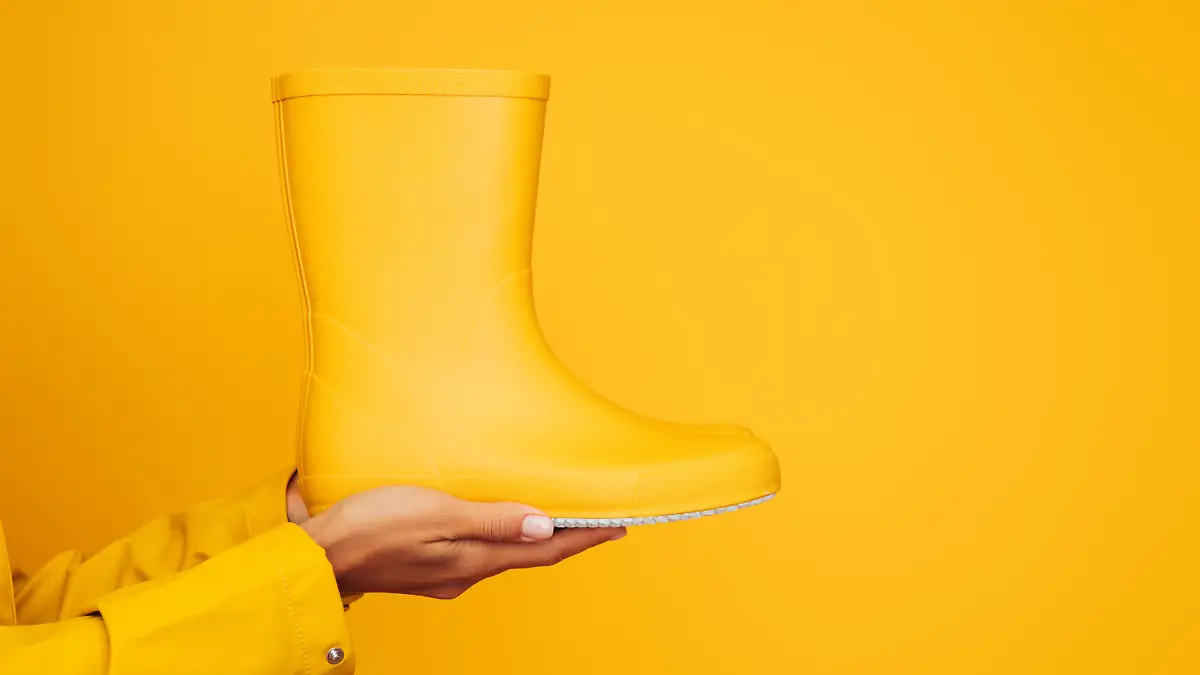 One yellow rubber boot