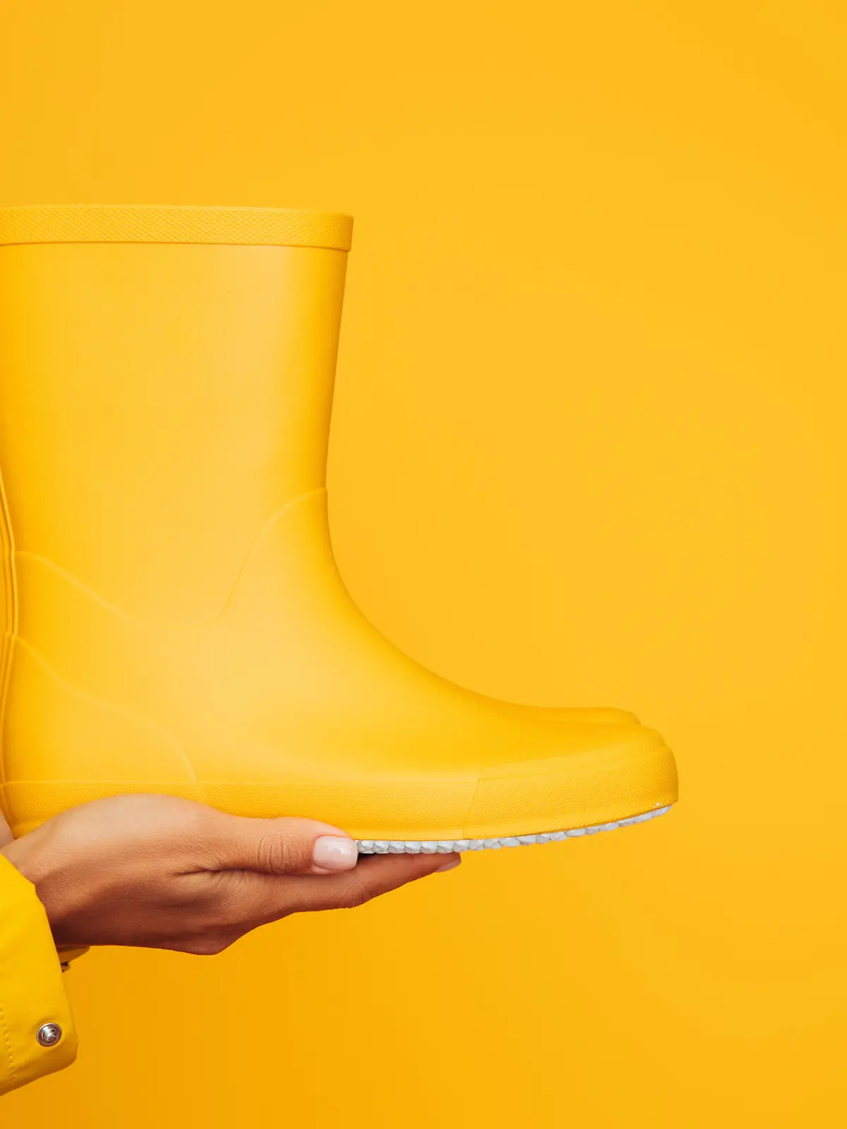 One yellow rubber boot