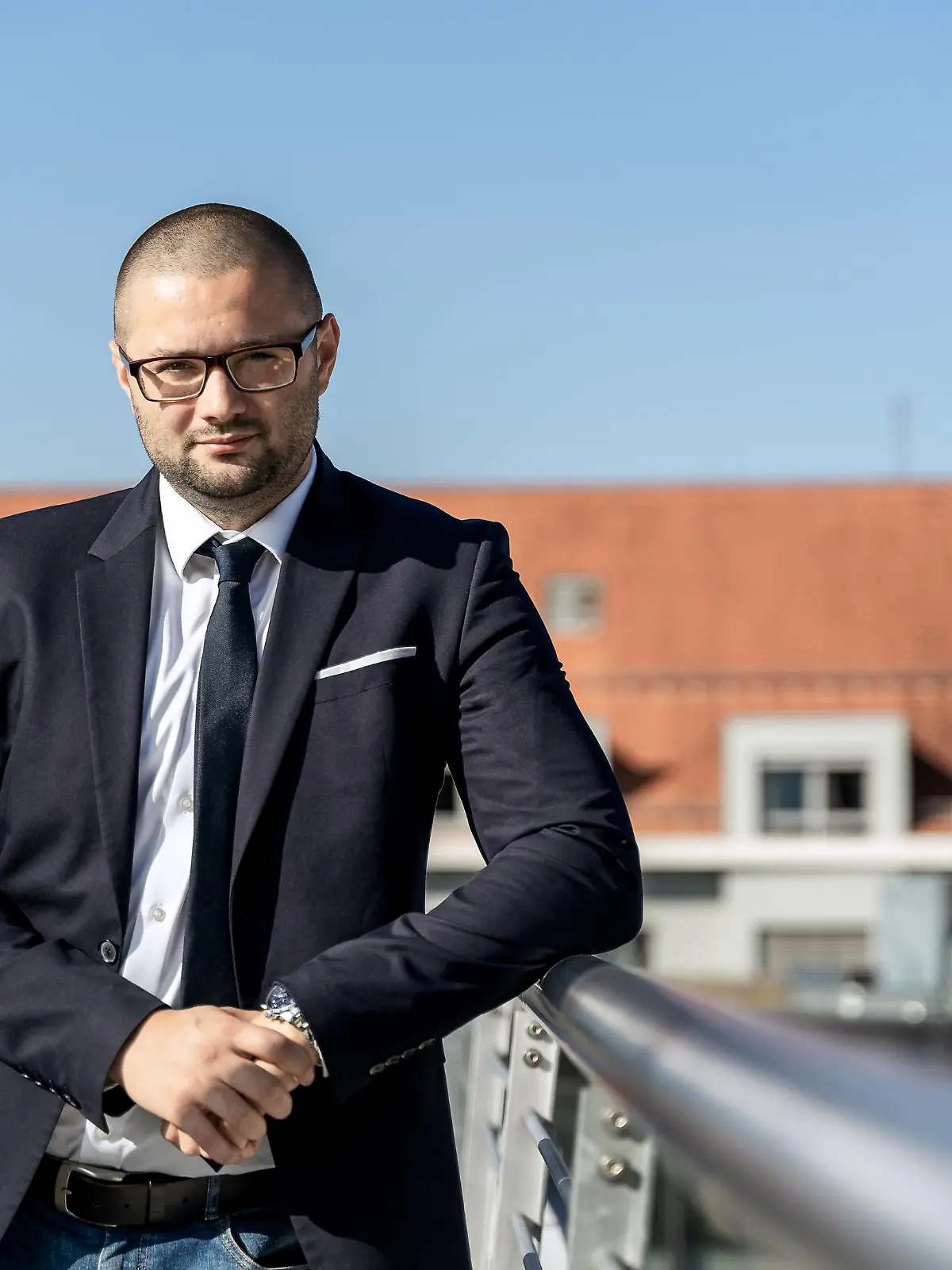 Augsburg, Bavaria, Germany - 06 September 2021: Mr. Andreas Jurca, city councilor of the party Afd Alternative for Germany above the rooftops of Augsburg makes preparations for the election campaign for the Bundestag election 2021 *** Herr Andreas Jurca, Stadtrat der Partei Afd Alternative für Deutschland über den Dächern Augsburgs trifft Vorbereitungen für den Wahlkampf für die Bundestagswahl 2021 