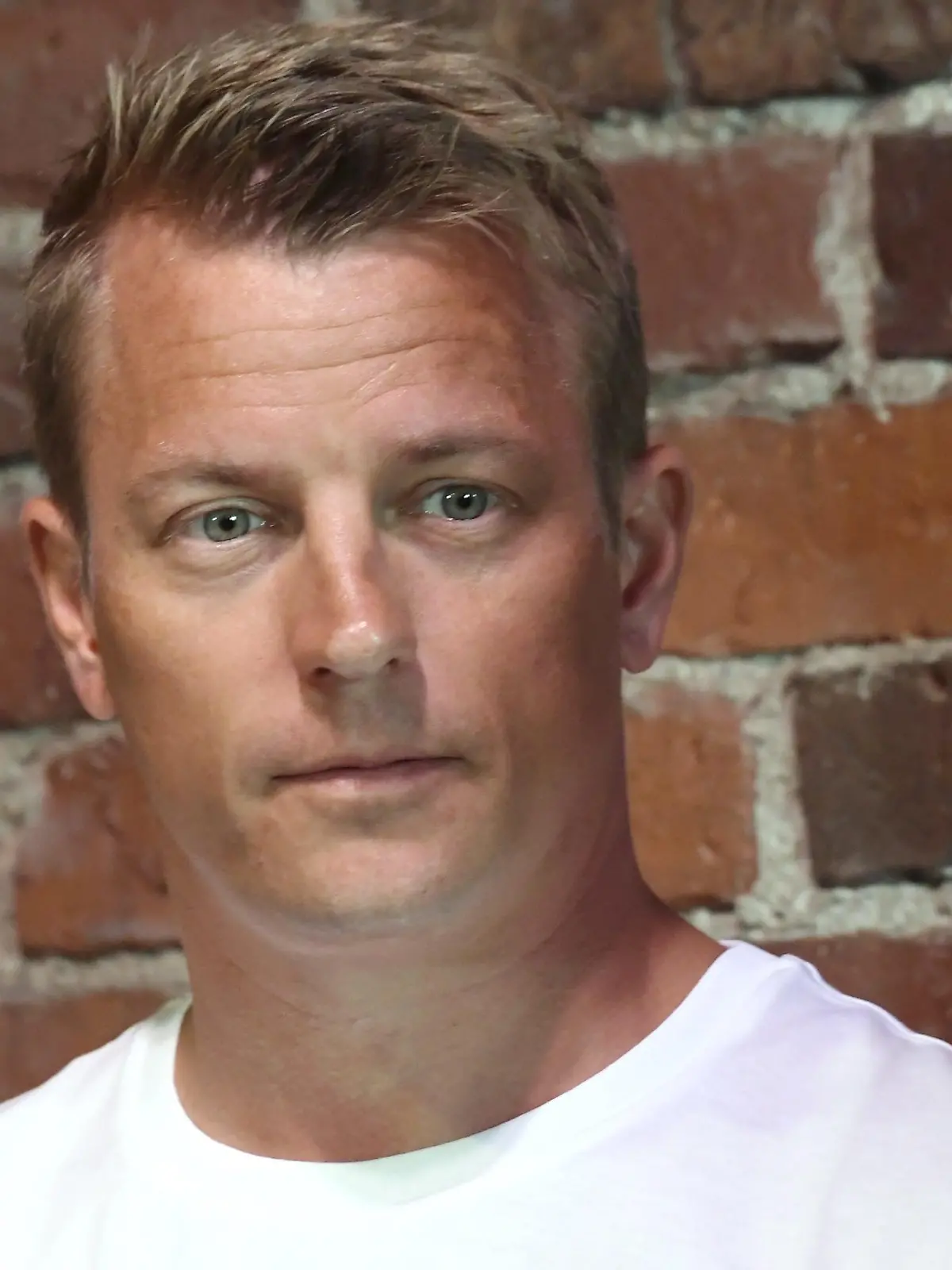 ARCHIV - 16.08.2018, Finnland, Helsinki: Der finnische Formel-1-Pilot Kimi Räikkönen bei der Veröffentlichung seiner Biographie «Unknown Kimi Räikkönen». (zu dpa: "Beschwipster Räikkönen hat Spaß bei Abschlussparty" vom 08.12.2018) Foto: Markku Ulander/Lehtikuva/dpa +++ dpa-Bildfunk +++