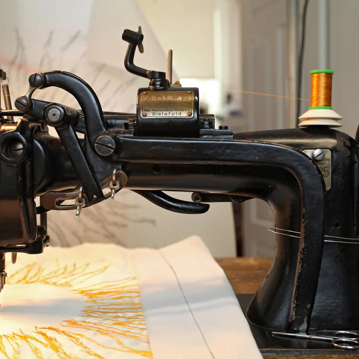 Logo von Stickmaschine