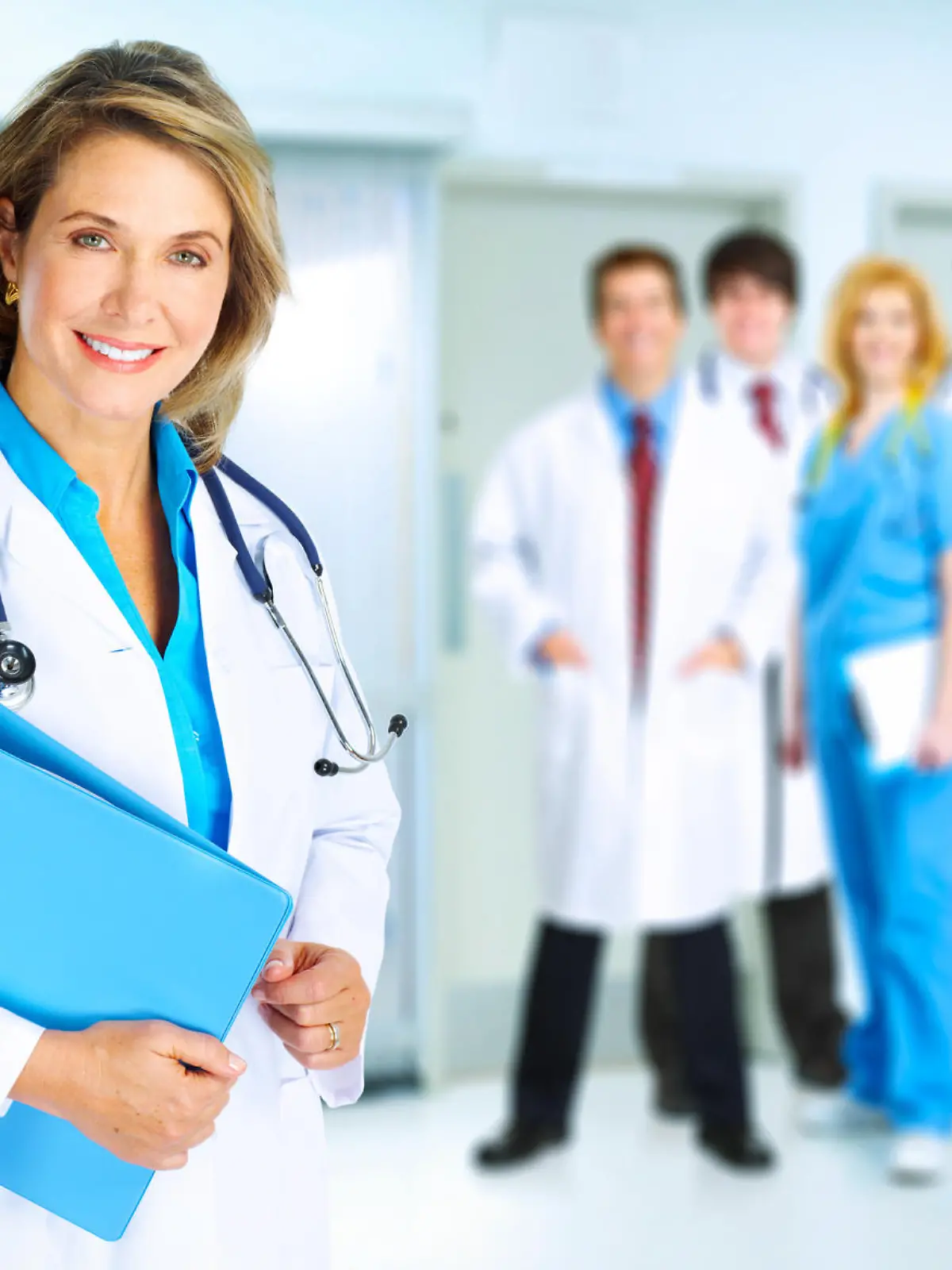 Smiling family doctor woman with stethoscope. Health care.