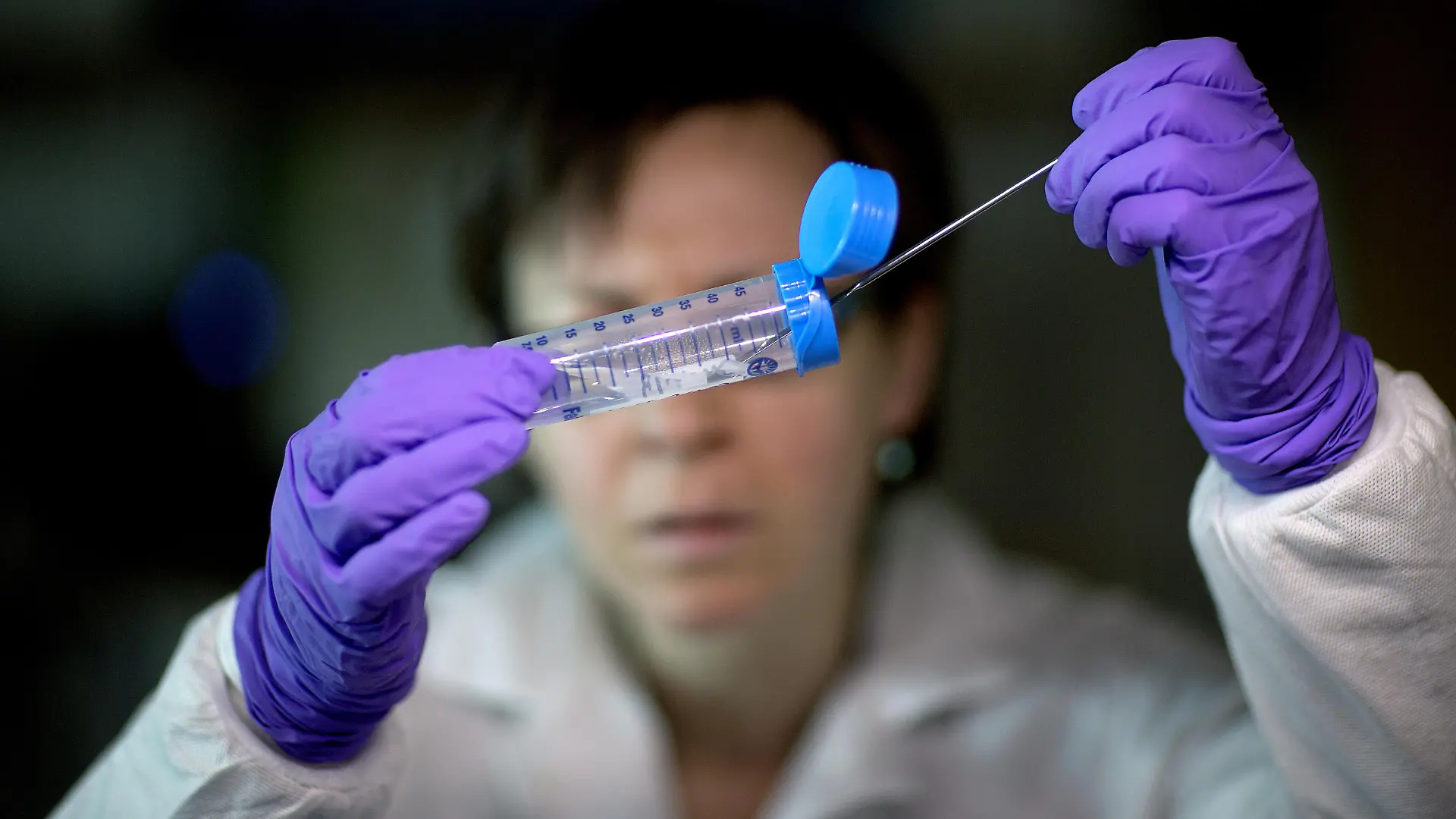 This photo taken Nov. 25, 2013 shows microbiologist Dr. Molly Freeman pulling Listeria bacteria from a tube to be tested for its DNA fingerprinting in a foodborne disease outbreak lab at the federal Centers for Disease Control and Prevention in Atlanta. The nation's disease detectives are beginning a program to try to outsmart outbreaks by routinely decoding the DNA of deadly bacteria and viruses. The initial target: Listeria, a kind of bacteria that's the third-leading cause of death from food poisoning, and one that's especially dangerous to pregnant women. Already, the technology has helped to solve a small listeria outbreak that killed one person in California and sickened seven others in Maryland.(AP Photo/David Goldman) |