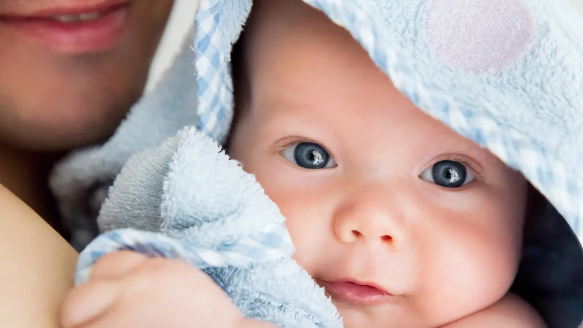 Cutest baby child after bath with towel on head