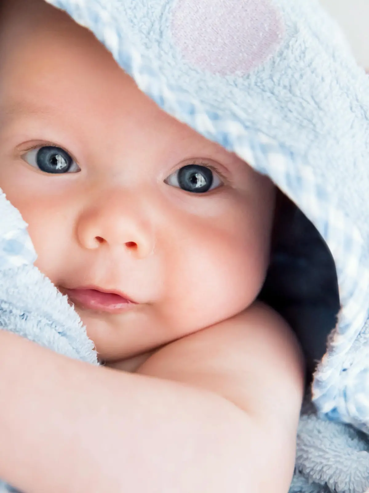 Cutest baby child after bath with towel on head