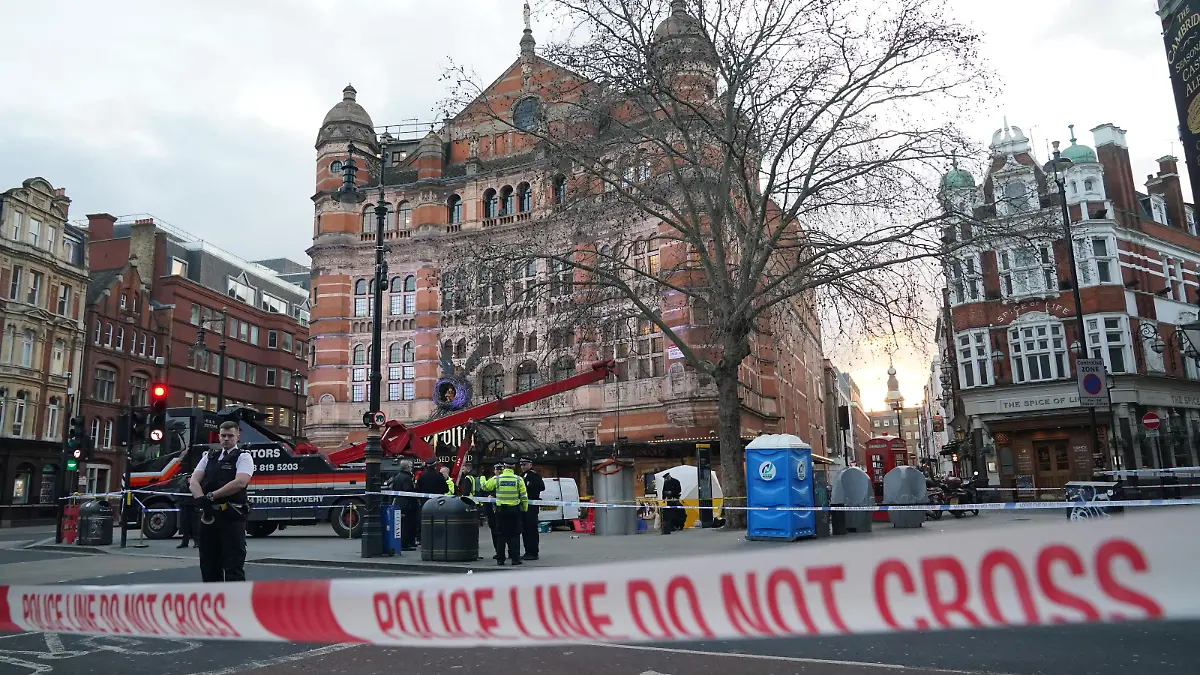 Man crushed by telescopic urinal. A police tent is erected at Cambridge Circus on the junction between Shaftesbury Avenue and Charing Cross Road in London, after a man has been crushed by a telescopic urinal. Fire crews said the man has been freed and is in the care of the London Ambulance Service. Roads in the area have been closed. Picture date: Friday January 27, 2023. See PA story POLICE Urinal. Photo credit should read: Jonathan Brady/PA Wire URN:70750619