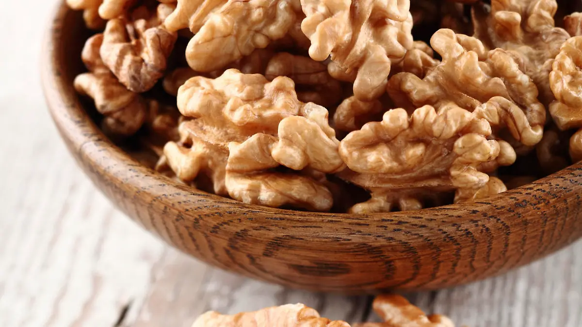 Walnuts in a wooden plate