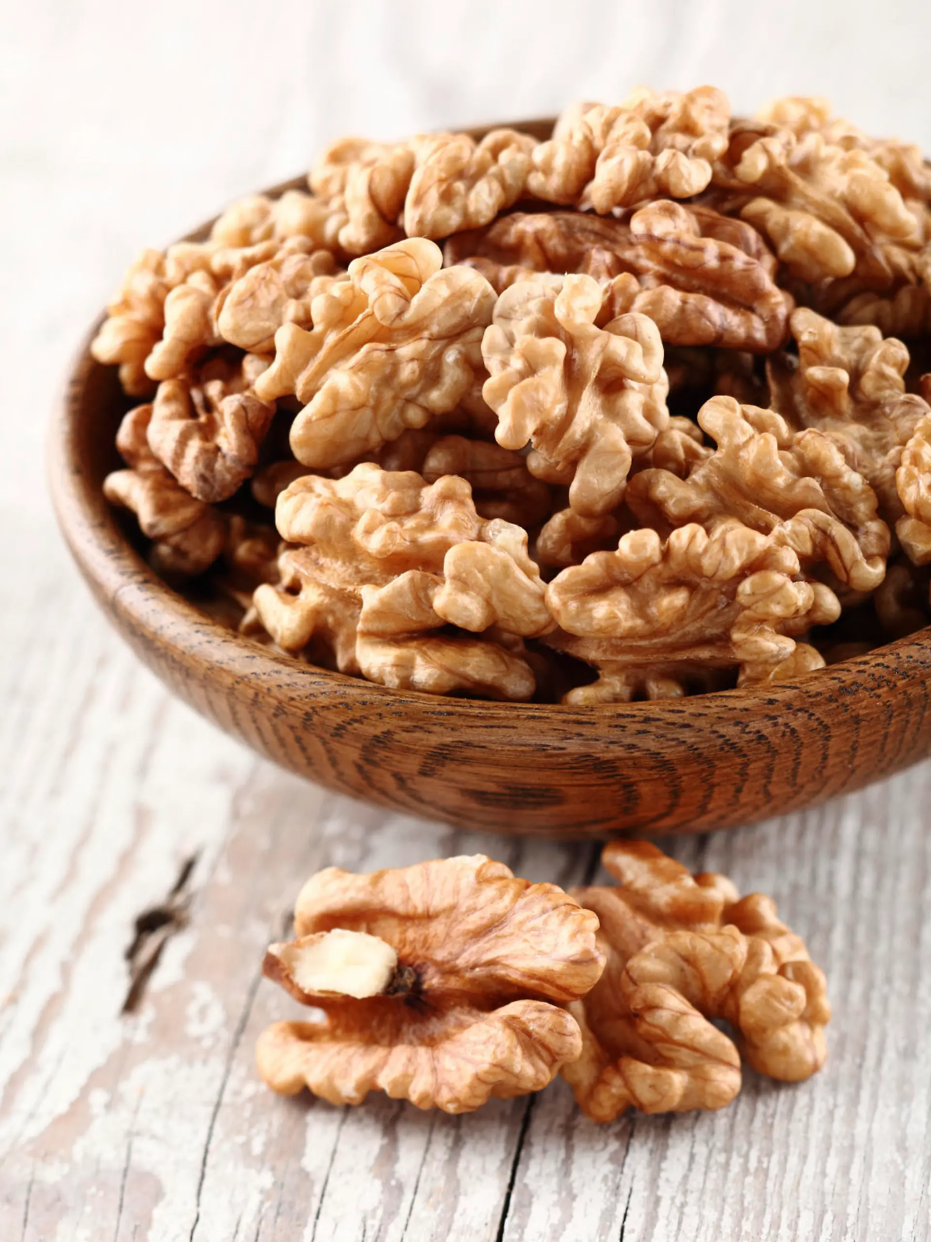 Walnuts in a wooden plate