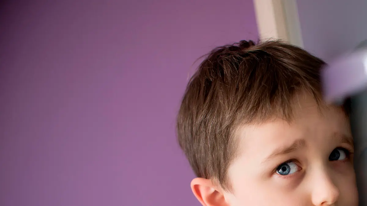 Little boy overhears fight of his parents through the door