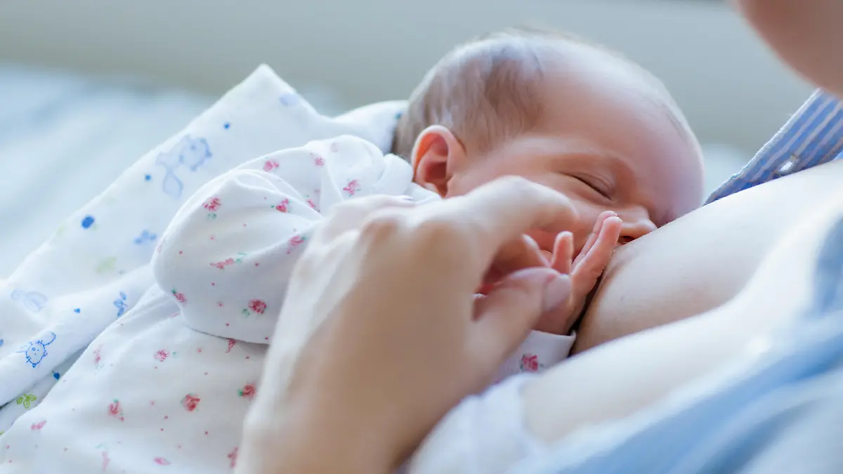 benefits of breastfeeding for newborns. happy motherhood. family values.