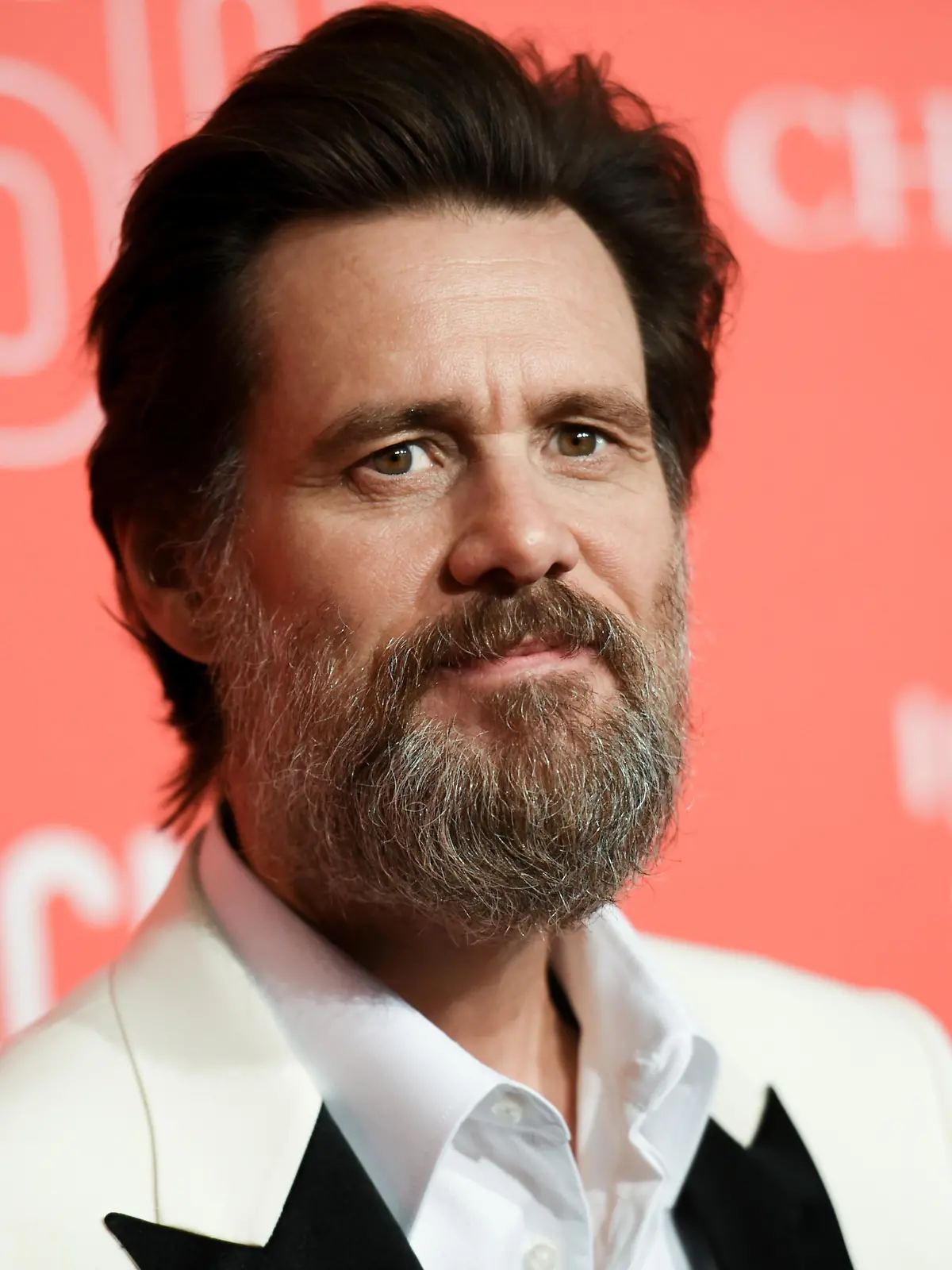 FILE - In this April 18, 2015 file photo, Jim Carrey arrives at LACMA's 50th Anniversary Gala in Los Angeles. Carrey says he was shocked and saddened to learn of the death of ex-girlfriend Cathriona White, likening the news to being hit by a lightning bolt. The 30-year-old makeup artist was found dead in her Sherman Oaks apartment on Monday, Sept. 28, according to the Los Angeles County Coroner¿s Office. Her death is being investigated as a possible suicide in the ongoing case with an examination scheduled for Wednesday.  (Photo by Richard Shotwell/Invision/AP, File) |