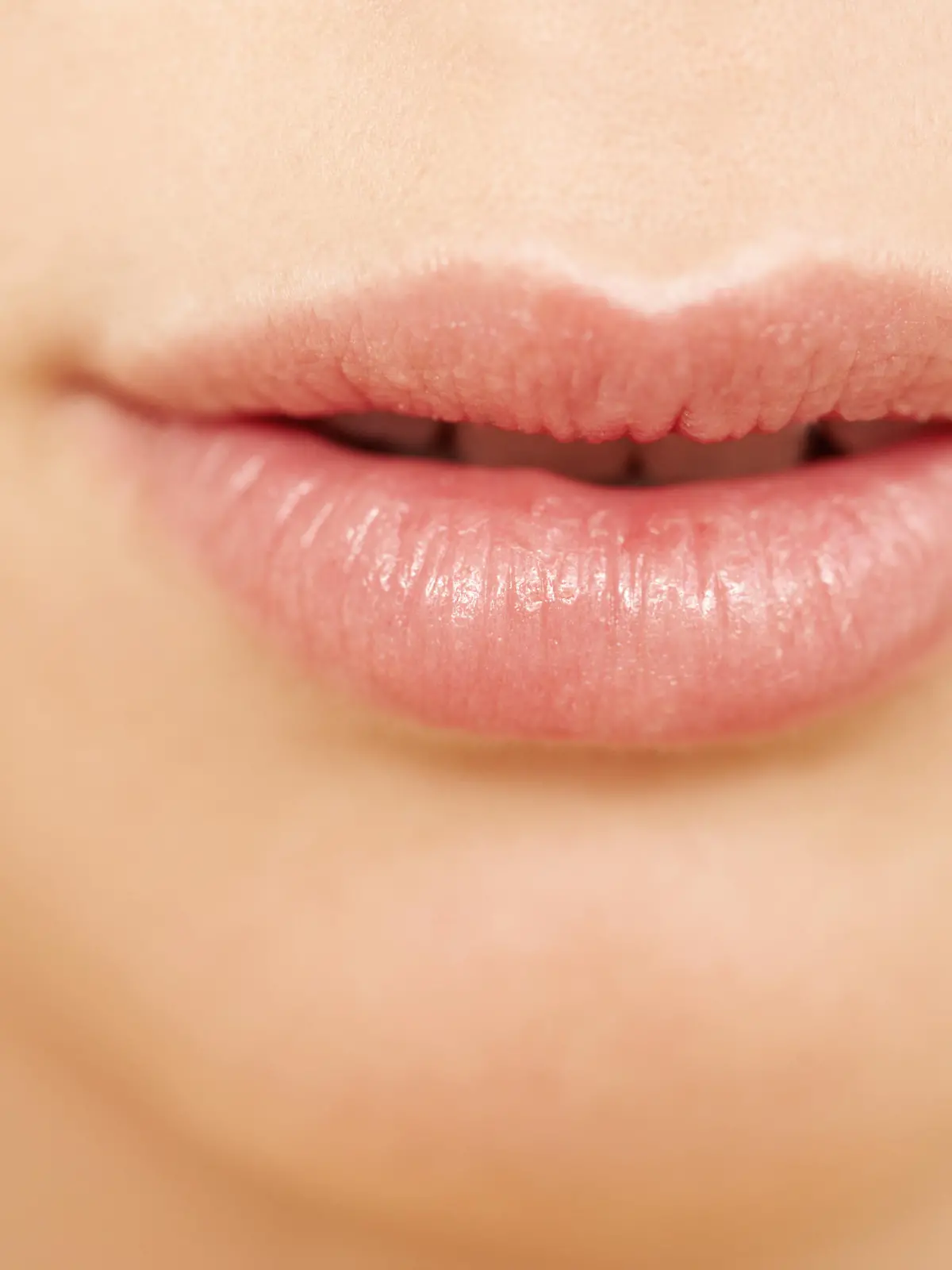 Cropped closeup image of soft pink lips - Beauty and skincare
