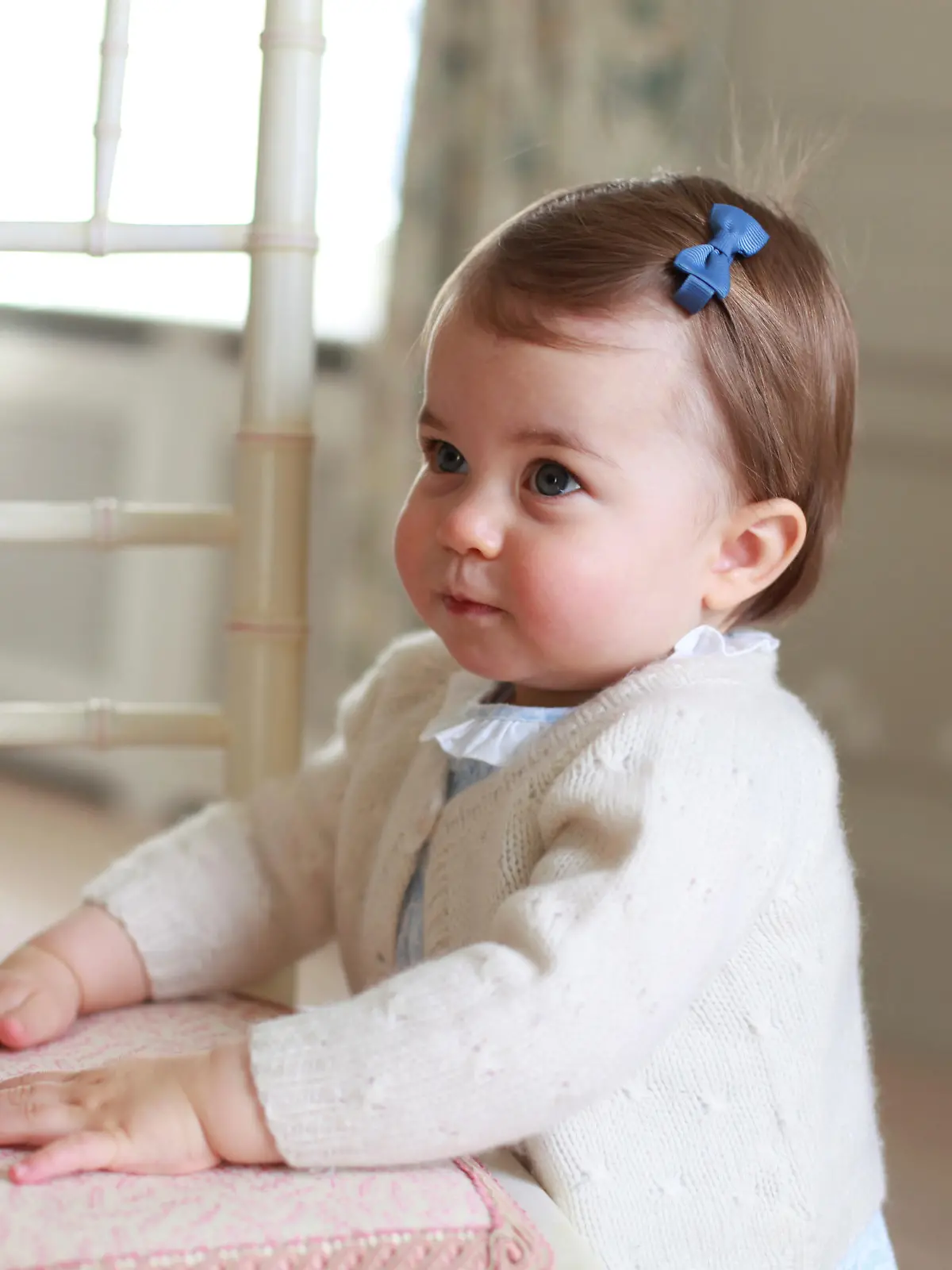 Britain's Princess Charlotte, daughter of the Duke and Duchess of Cambridge, Prince William and his wife Catherine, poses for a photograph in this undated photograph taken by her mother, at Anmer Hall in Norfolk, Britain and released on May 1, 2016.  HRH The Duchess of Cambridge 2016/Courtesy of Kensington Palace/Handout via REUTERS.  ATTENTION EDITORS - THIS IMAGE HAS BEEN PROVIDED BY A THIRD PARTY. NO COMMERCIAL OR BOOK SALES. FOR EDITORIAL USE ONLY. NO RESALES. NO ARCHIVE. ONE TIME USE ONLY.    