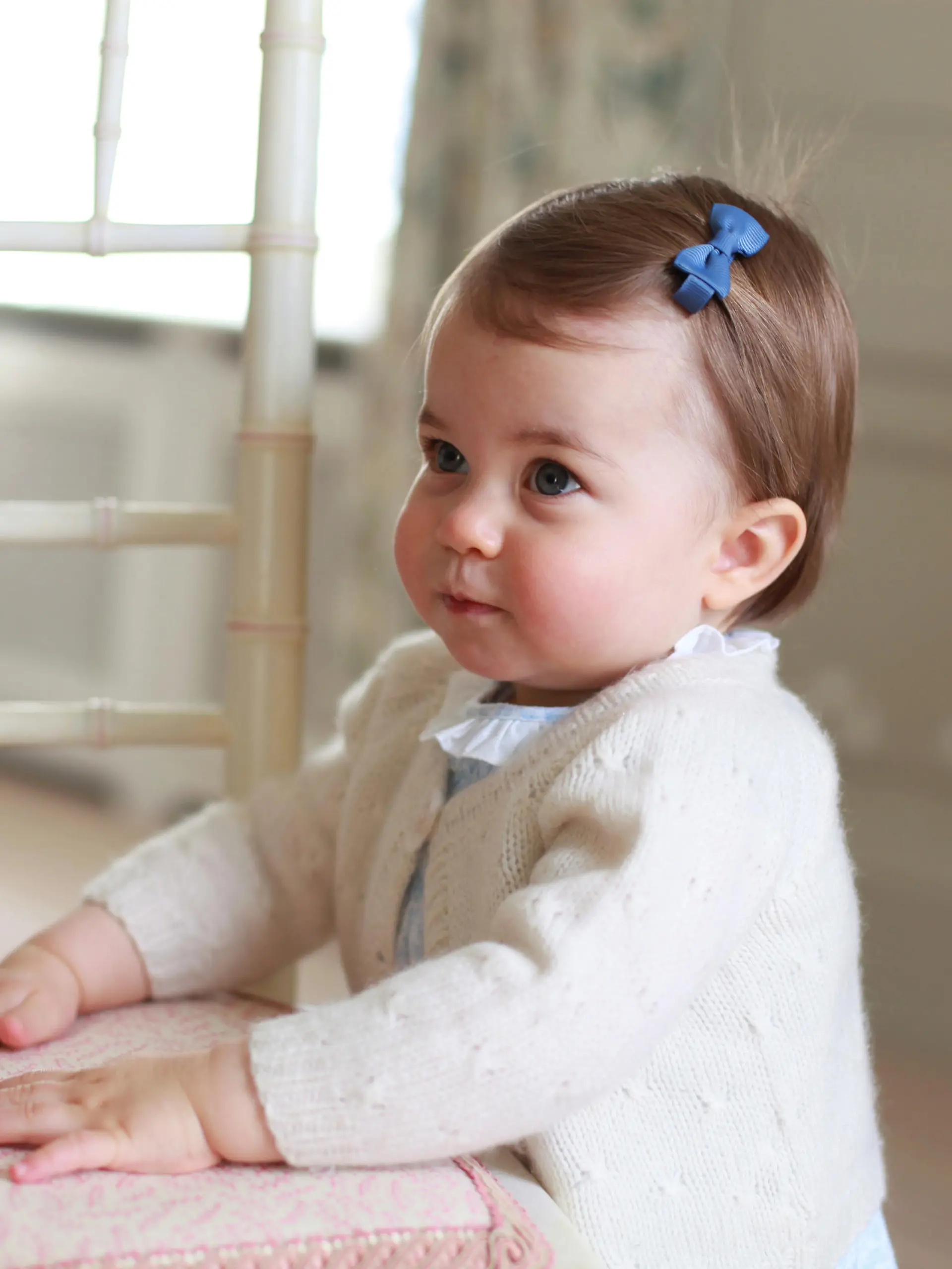 Britain's Princess Charlotte, daughter of the Duke and Duchess of Cambridge, Prince William and his wife Catherine, poses for a photograph in this undated photograph taken by her mother, at Anmer Hall in Norfolk, Britain and released on May 1, 2016.  HRH The Duchess of Cambridge 2016/Courtesy of Kensington Palace/Handout via REUTERS.  ATTENTION EDITORS - THIS IMAGE HAS BEEN PROVIDED BY A THIRD PARTY. NO COMMERCIAL OR BOOK SALES. FOR EDITORIAL USE ONLY. NO RESALES. NO ARCHIVE. ONE TIME USE ONLY.    