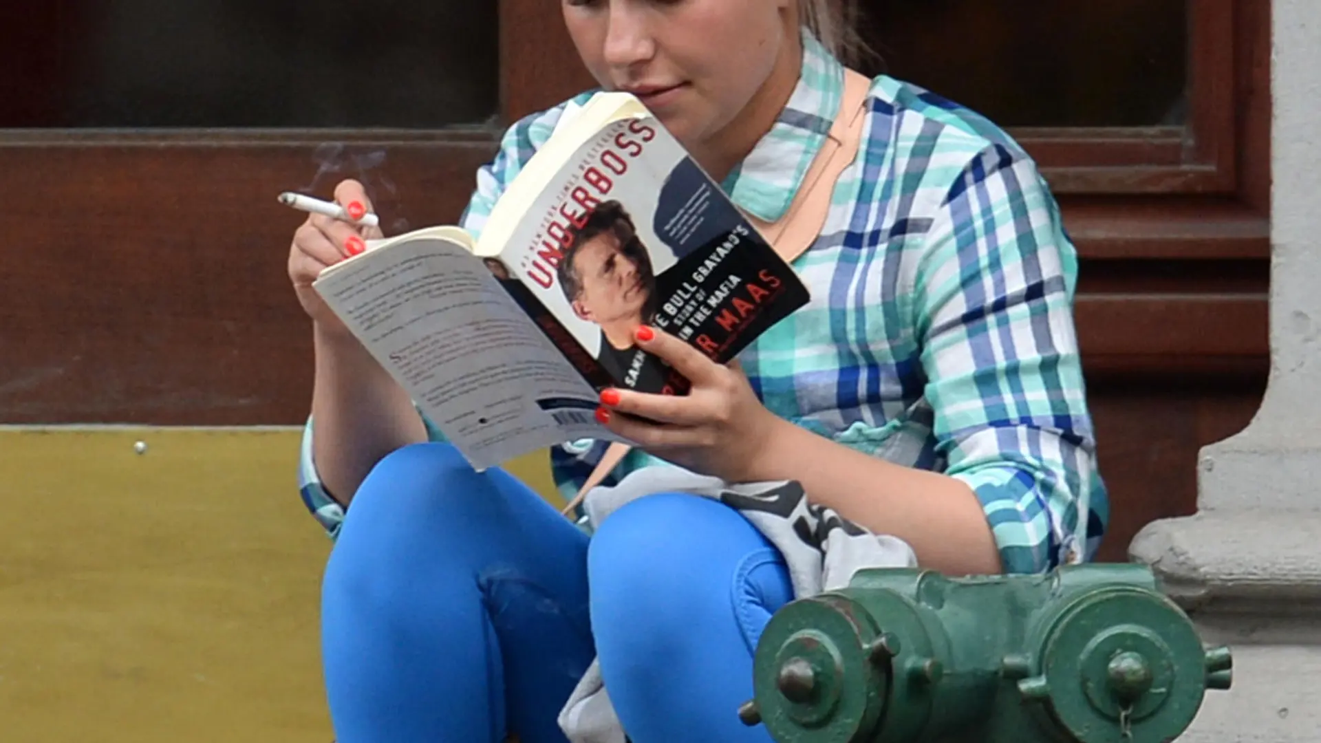 EXCLUSIVE: Nashville star Hayden Panettierre takes a break on a New York doorstep to read her book on July 4th. The pint-sized actress looked engrossed in 'Underboss: Sammy 'The Bull' Gravano's Story of Life in the Mafia' as shoppers walked by her on Fifth Avenue.<P>Pictured: Hayden Panettiere<B>Ref: SPL1311873  040716   EXCLUSIVE</B><BR/>Picture by: Splash News<BR/></P><P><B>Splash News and Pictures</B><BR/>Los Angeles:	310-821-2666<BR/>New York:	212-619-2666<BR/>London:	870-934-2666<BR/>photodesk@splashnews.com<BR/></P>
