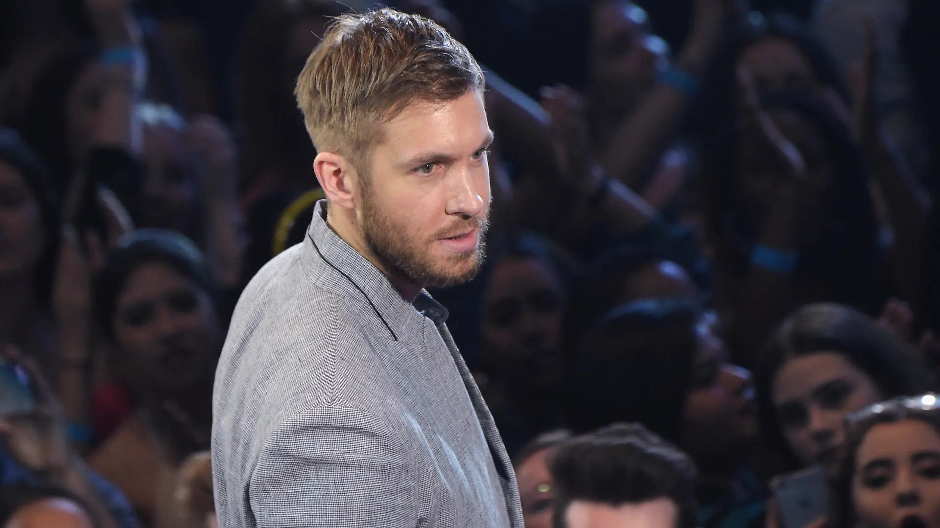 INGLEWOOD, CALIFORNIA - APRIL 03:  Recording artist Calvin Harris accepts the award for 'Dance Artist of the Year,' onstage at the iHeartRadio Music Awards which broadcasted live on TBS, TNT, AND TRUTV from The Forum on April 3, 2016 in Inglewood, California.  (Photo by Jason Kempin/Getty Images for iHeartRadio / Turner)