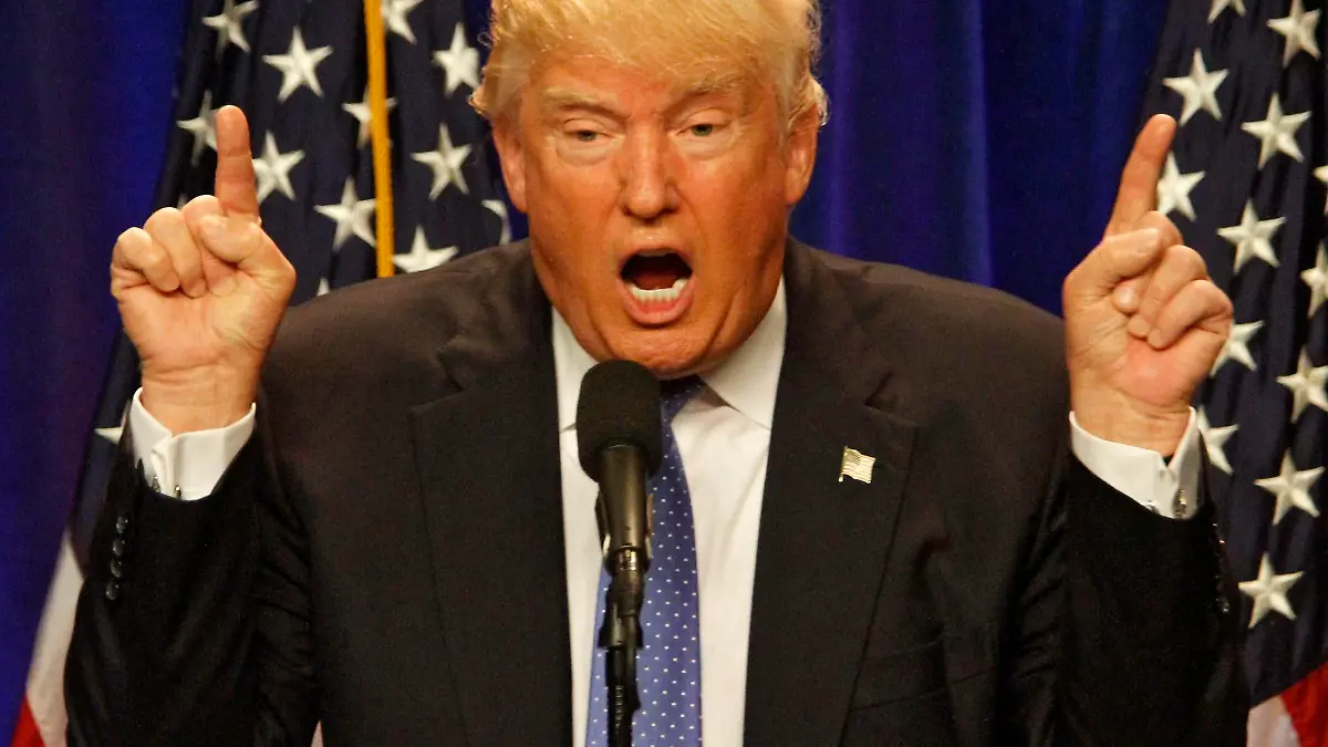 epa05362670 Republican presidential candidate Donald Trump speaks during a rally at St Anselm College in Manchester, New Hampshire, USA, 13 June 2016. EPA/HERB SWANSON +++(c) dpa - Bildfunk+++