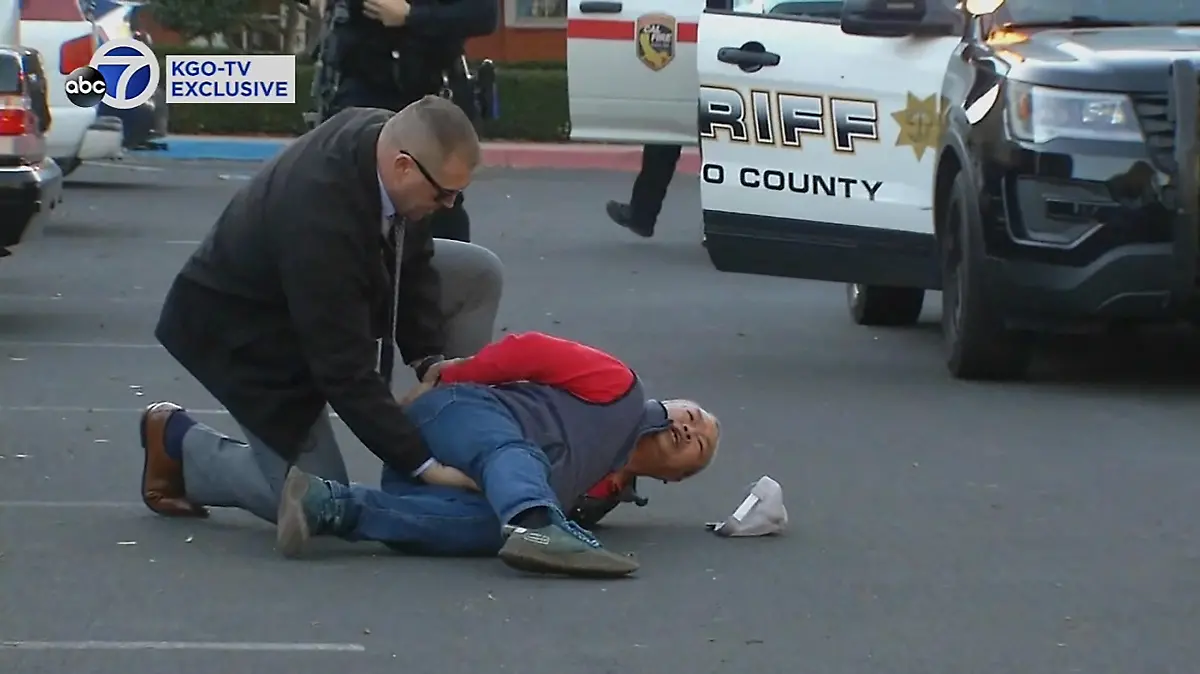 A suspect is arrested by law enforcement personnel after a mass shooting at two locations in the coastal northern California city of Half Moon Bay, California, U.S. January 23, 2023 in a still image from video.   ABC Affiliate KGO via REUTERS. NO RESALES. NO ARCHIVES. MANDATORY CREDIT. DO NOT OBSCURE KGO EXCLUSIVE CREDIT