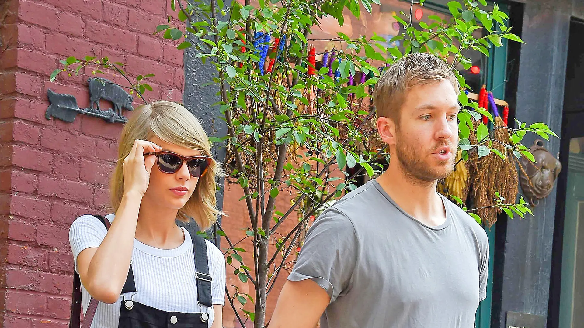 Cute Couple; Taylor Swift and Calvin Harris spotted holding hands while leaving The Spotted Pig Restaurant, after having lunch with Taylor's best male friend, Ed Sheeran, in the West Village in New York City.<P>Pictured: Taylor Swift and Calvin Harris<B>Ref: SPL1039395  280515  </B><BR/>Picture by: Splash News<BR/></P><P><B>Splash News and Pictures</B><BR/>Los Angeles:	310-821-2666<BR/>New York:	212-619-2666<BR/>London:	870-934-2666<BR/>photodesk@splashnews.com<BR/></P>