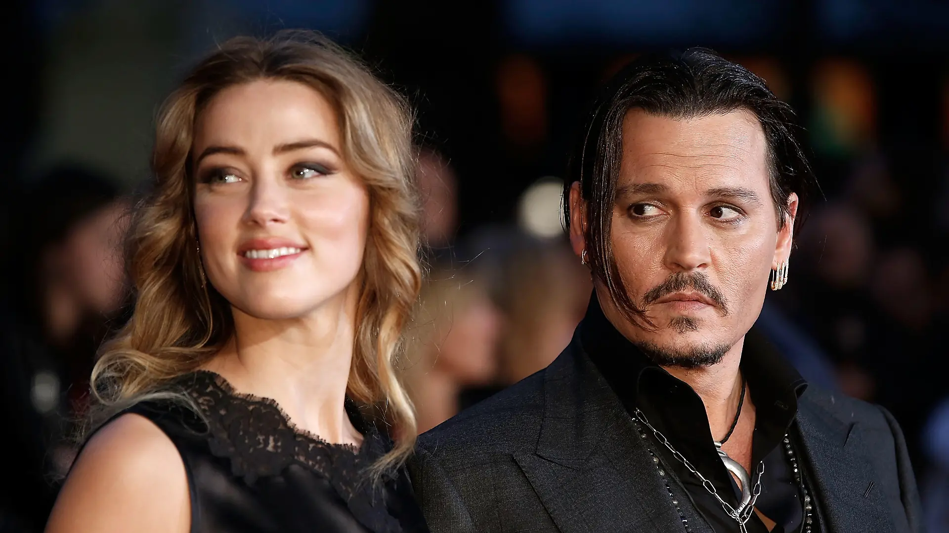 LONDON, ENGLAND - OCTOBER 11: Amber Heard and Johnny Depp attend the "Black Mass" Virgin Atlantic Gala screening during the BFI London Film Festival, at Odeon Leicester Square on October 11, 2015 in London, England. (Photo by John Phillips/Getty Images for BFI)