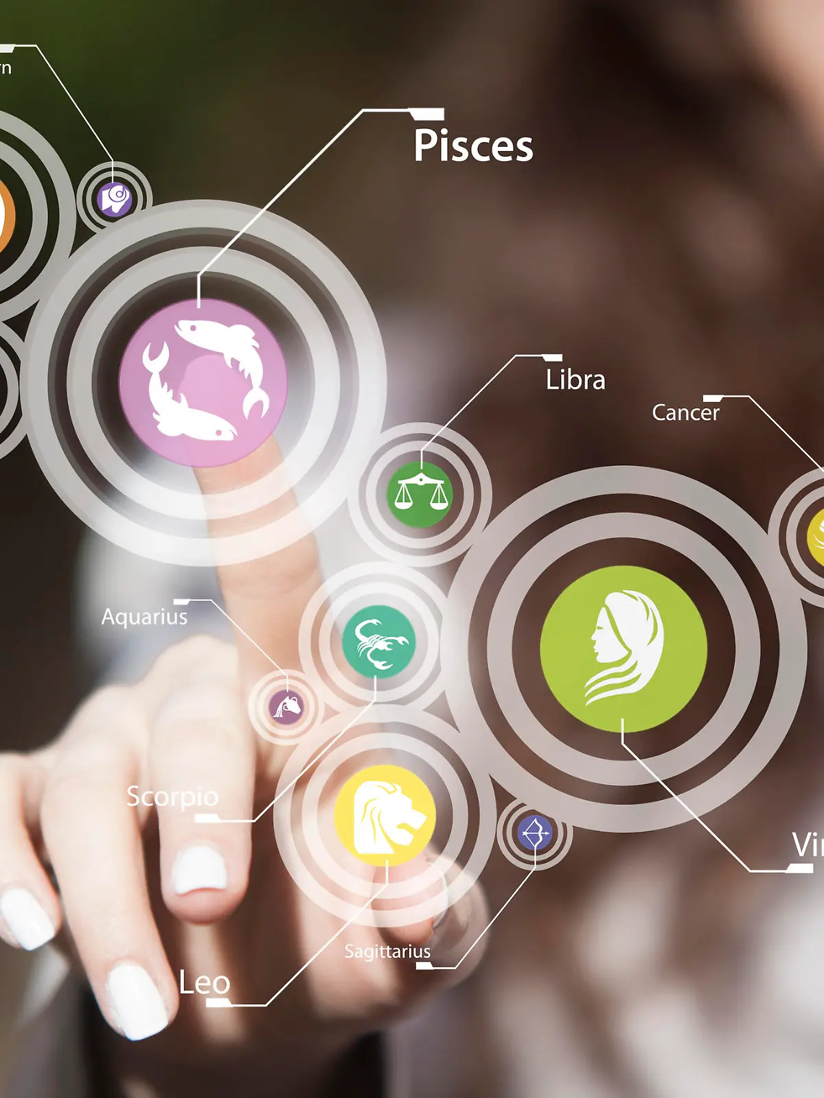 Woman choosing Pisces zodiac sign on digitally generated menu on touch screen. Horoscope signs on touch screen.