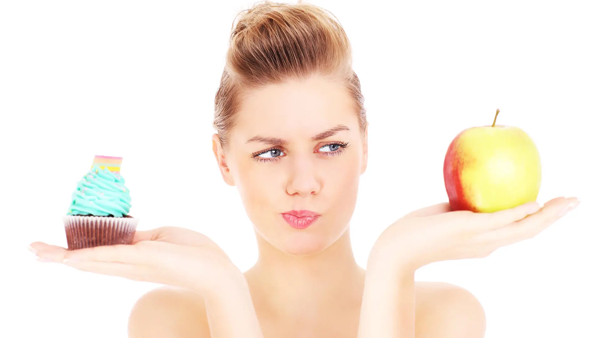 A picture of a woman trying to make a decision between cupcake and apple over white background