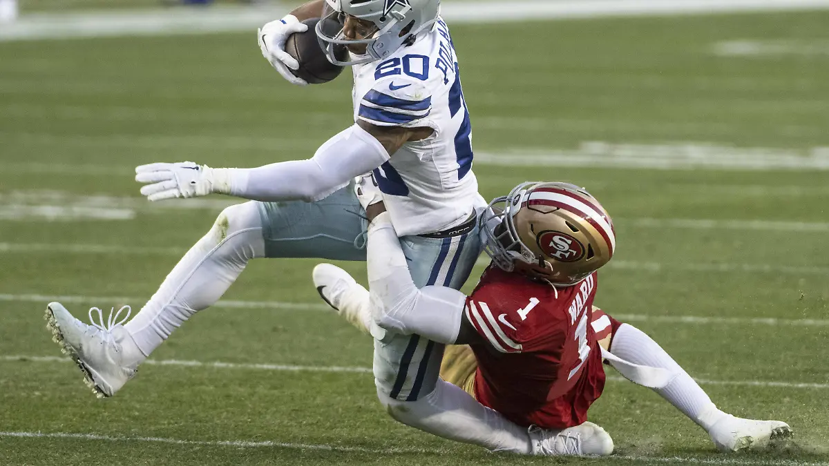 San Francisco 49ers cornerback Jimmie Ward 1 lands on the ankle of Dallas Cowboys running back Tony Pollard 20 while making a tackle in the second quarter of the NFC Divisional Playoffs at Levi s Stadium in Santa Clara, California on Sunday, January 22, 2023. Pollard left the game and was diagnosed with a fractured left fibula. The 49ers defeated the Cowboys 19-12 to move on to the NFC Championship against the Philadelphia Eagles. PUBLICATIONxINxGERxSUIxAUTxHUNxONLY SXP2023012217 TERRYxSCHMITT
