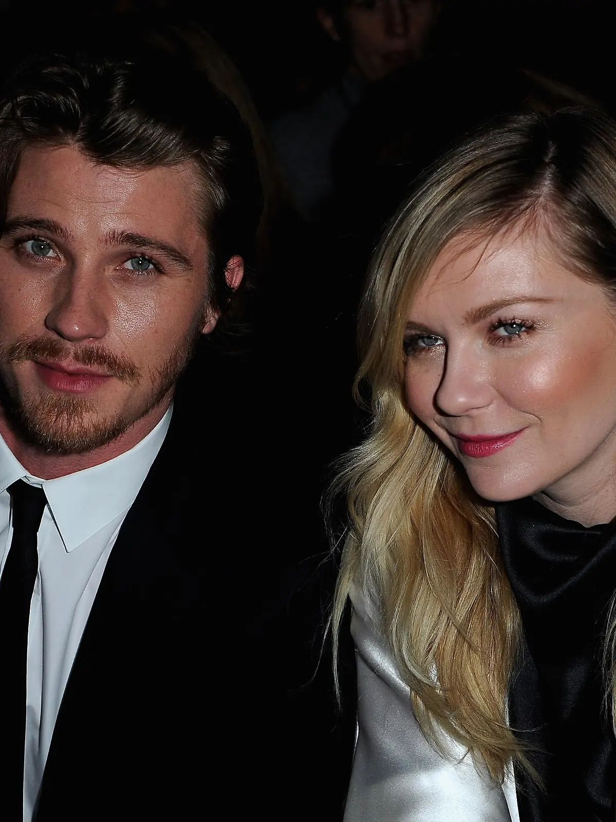 PARIS, FRANCE - MARCH 04:  Kirsten Dunst and Garrett Hedlund attend the Saint Laurent Fall/Winter 2013 Ready-to-Wear show as part of Paris Fashion Week on March 4, 2013 in Paris, France.  (Photo by Pascal Le Segretain/Getty Images)