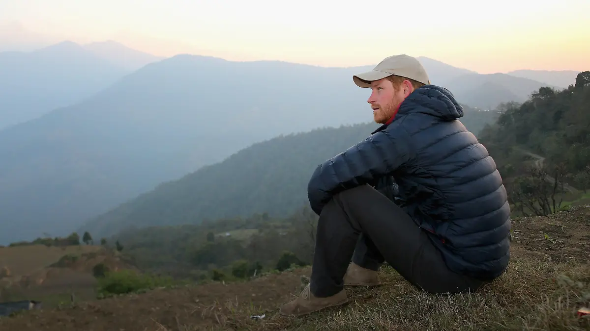 LEORANI, NEPAL - MARCH 22:  Prince Harry watches the sun rise after spending the night in the Himalayan  hilltop village of Leorani on day four of his visit to Nepal on March 22, 2016 in Leorani, Nepal. Prince Harry is on a five day visit to Nepal, his first official tour of the country.  (Photo by Chris Jackson - Pool/Getty Images)