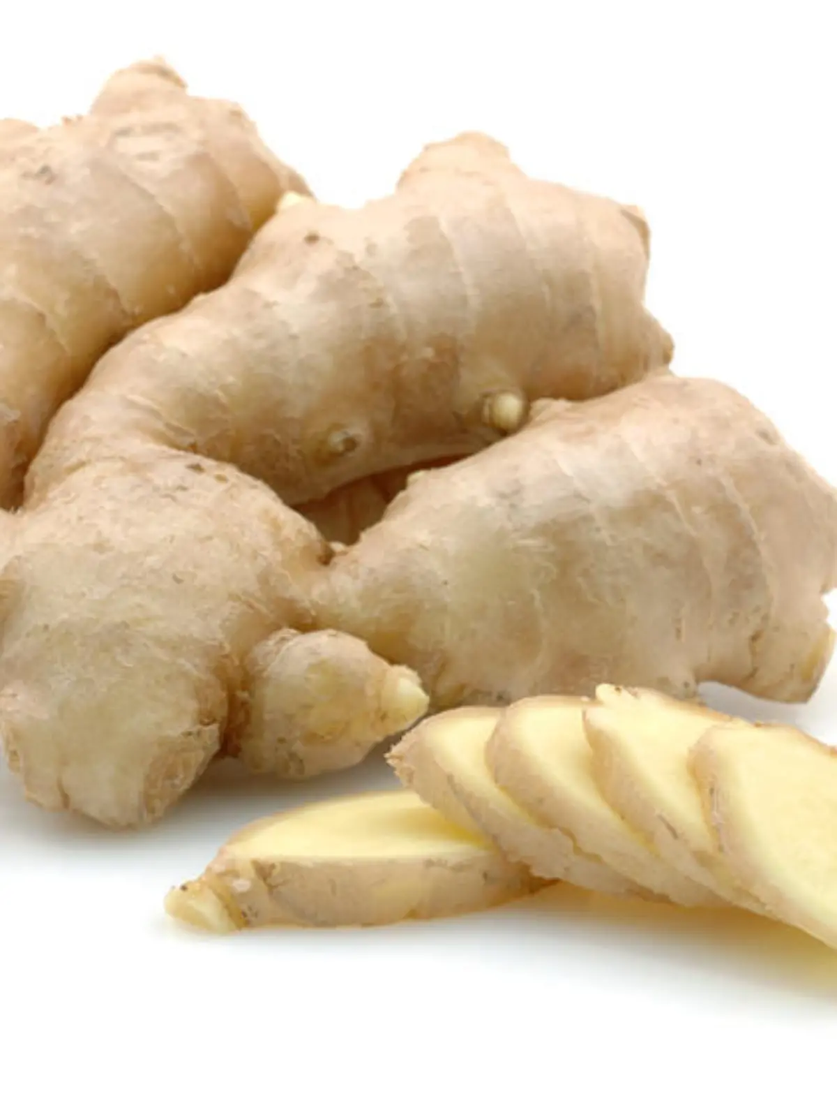 Whole and sliced ginger root in isolated white background