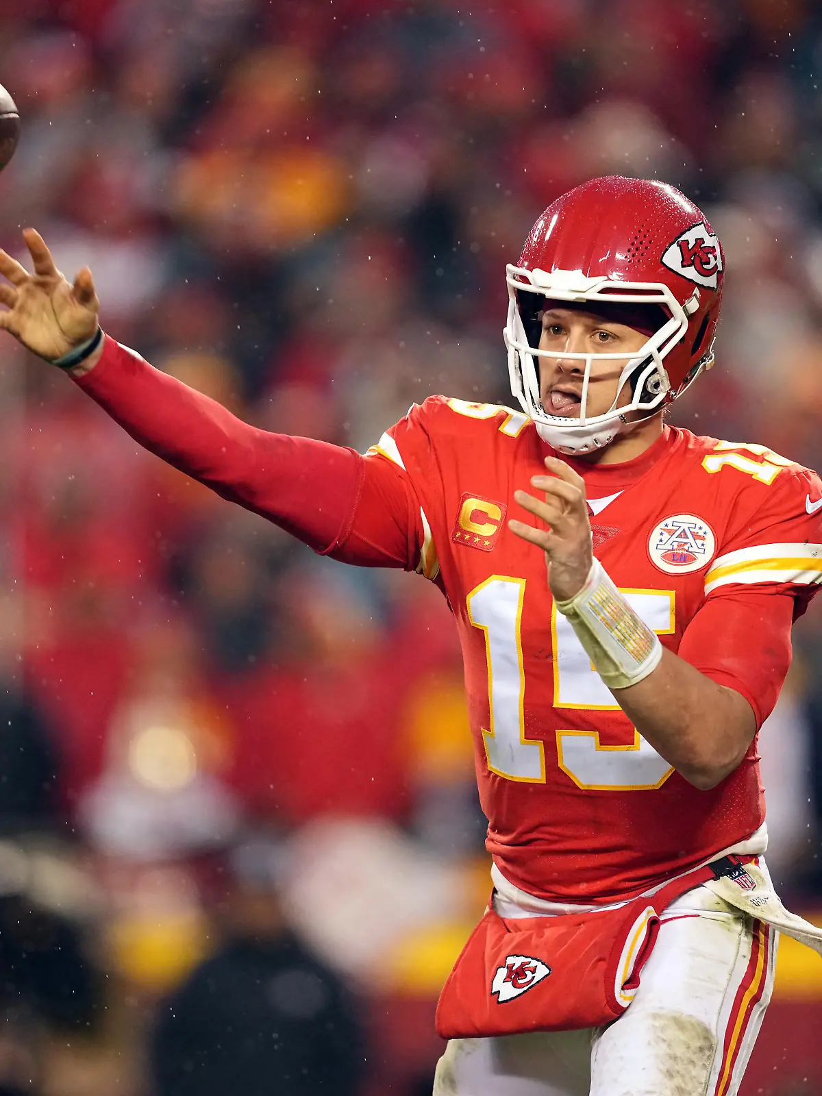 Jan 21, 2023; Kansas City, Missouri, USA; Kansas City Chiefs quarterback Patrick Mahomes (15) throws against the Jacksonville Jaguars during the second half in the AFC divisional round game at GEHA Field at Arrowhead Stadium. Mandatory Credit: Jay Biggerstaff-USA TODAY Sports