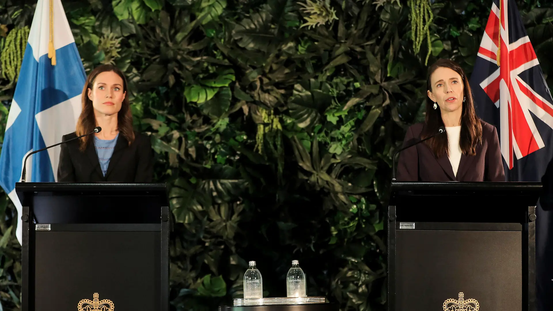 Finland's Prime Minister Sanna Marin, left, holds a joint press conference with New Zealand Prime Minister Jacinda Ardern at the Auckland Museum, in Auckland, New Zealand, Wednesday, Nov. 30, 2022. Marin says it must give more weapons and support to Ukraine to ensure it wins its war against Russia (Michael Craig/New Zealand Herald via AP)