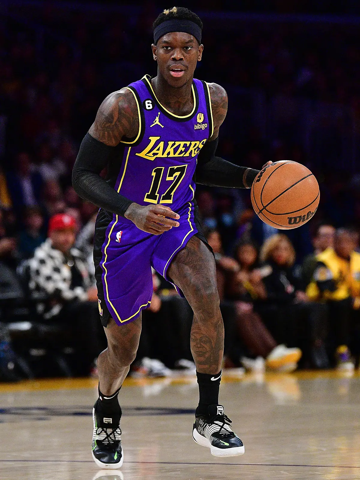 January 20, 2023; Los Angeles, California, USA; Los Angeles Lakers guard Dennis Schroder (17) controls the ball against the Memphis Grizzlies during the first half at Crypto.com Arena. Mandatory Credit: Gary A. Vasquez-USA TODAY Sports