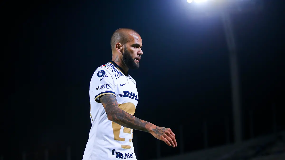 FILE - JANUARY 20, 2023: PUMAS UNAM Ternminates Dani Alves' contract after being arrested in Spain on allegations of sexual assault MEXICO CITY, MEXICO - SEPTEMBER 07: Dani Alves of Pumas looks on during the 13th round match between Pumas UNAM and Queretaro as part of the Torneo Apertura 2022 Liga MX at Olimpico Universitario Stadium on September 07, 2022 in Mexico City, Mexico. (Photo by Agustin Cuevas/Getty Images)