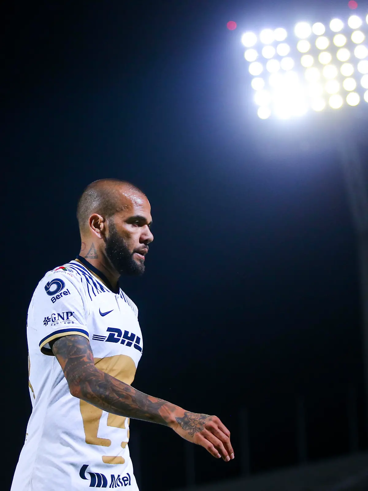 FILE - JANUARY 20, 2023: PUMAS UNAM Ternminates Dani Alves' contract after being arrested in Spain on allegations of sexual assault MEXICO CITY, MEXICO - SEPTEMBER 07: Dani Alves of Pumas looks on during the 13th round match between Pumas UNAM and Queretaro as part of the Torneo Apertura 2022 Liga MX at Olimpico Universitario Stadium on September 07, 2022 in Mexico City, Mexico. (Photo by Agustin Cuevas/Getty Images)