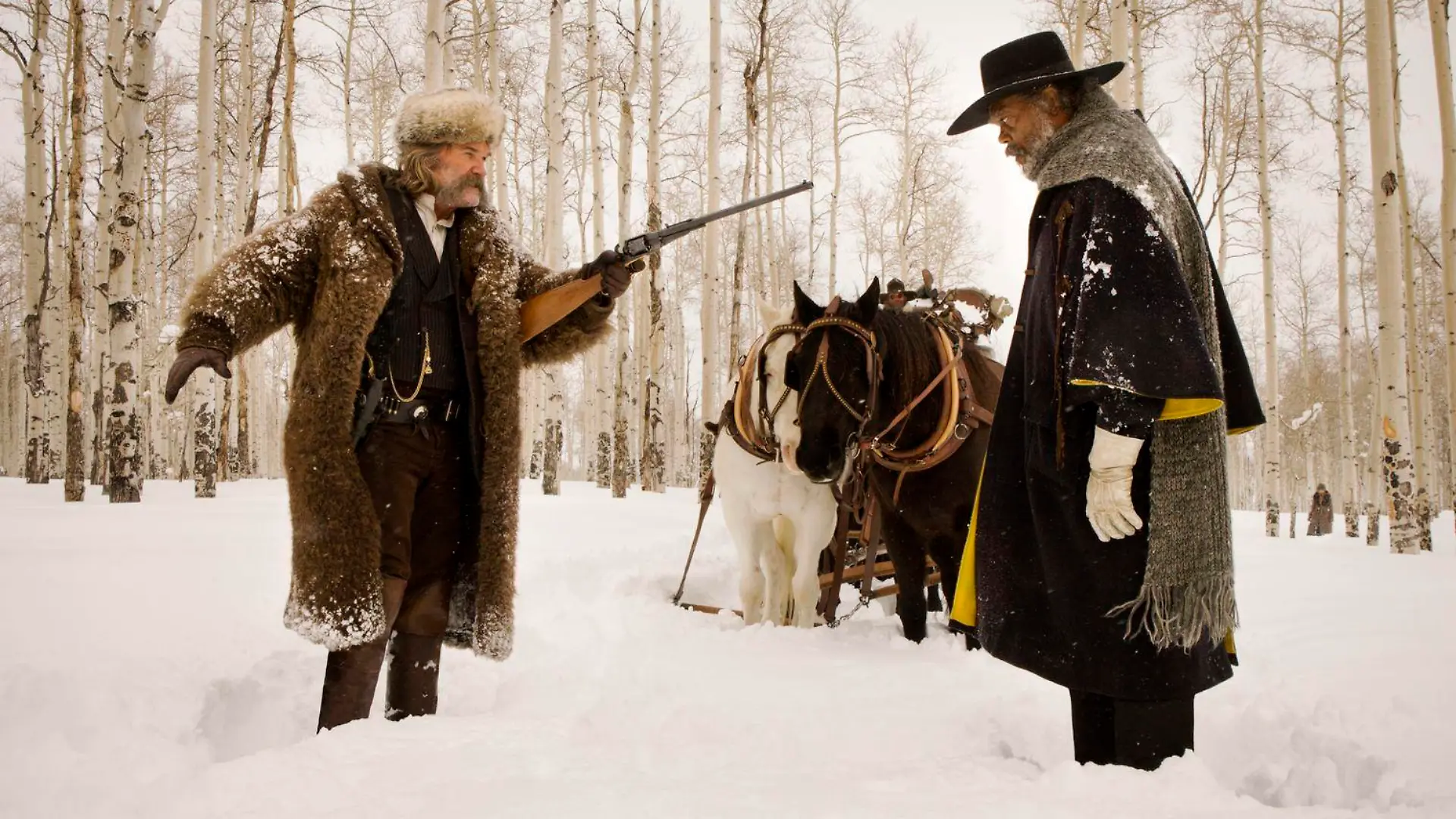 (L-R) KURT RUSSELL and SAMUEL L. JACKSON star in THE HATEFUL EIGHT. 
Photo: Andrew Cooper, SMPSP
© 2015 The Weinstein Company. All Rights Reserved. 
