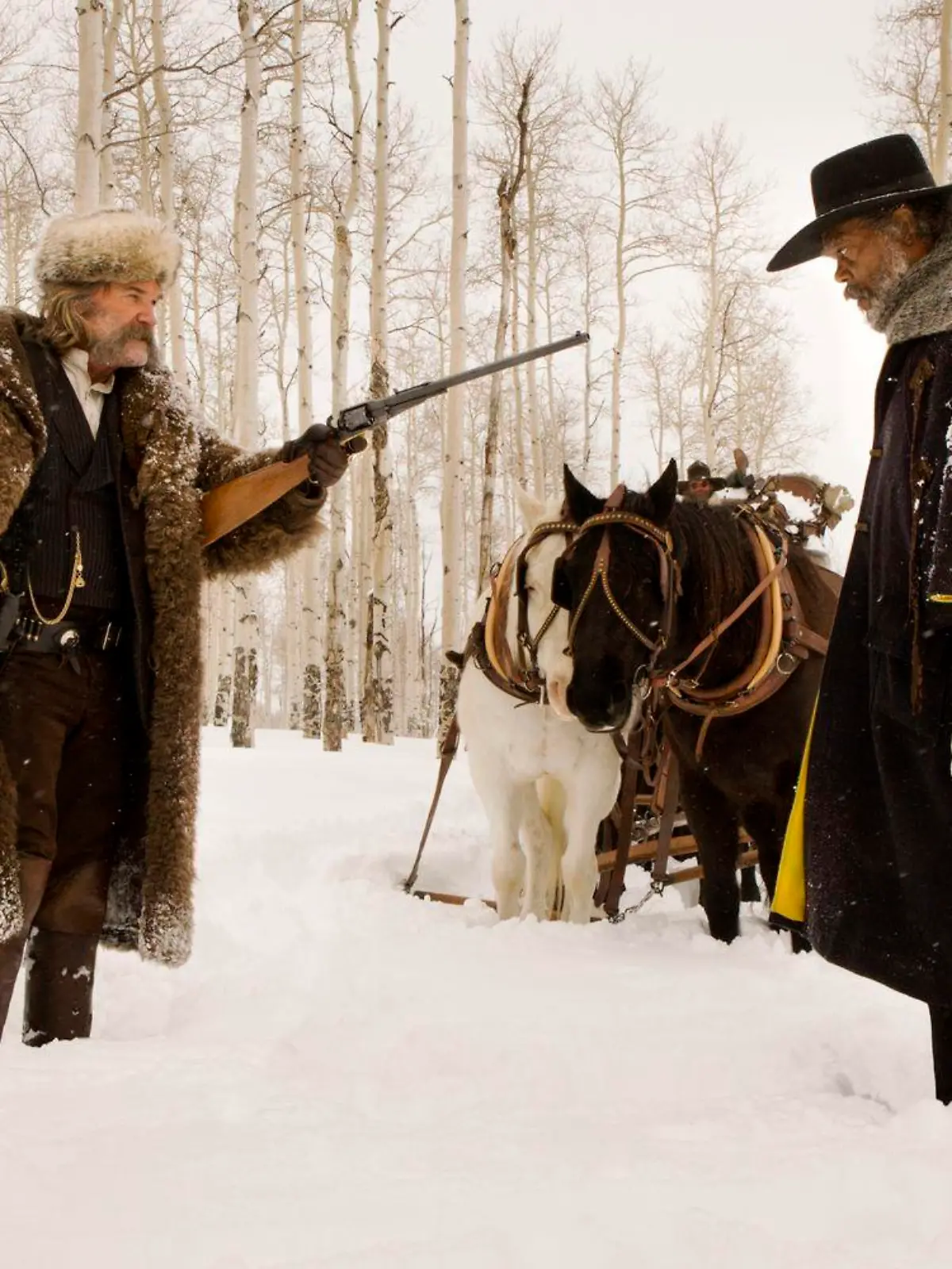 (L-R) KURT RUSSELL and SAMUEL L. JACKSON star in THE HATEFUL EIGHT. 
Photo: Andrew Cooper, SMPSP
© 2015 The Weinstein Company. All Rights Reserved. 
