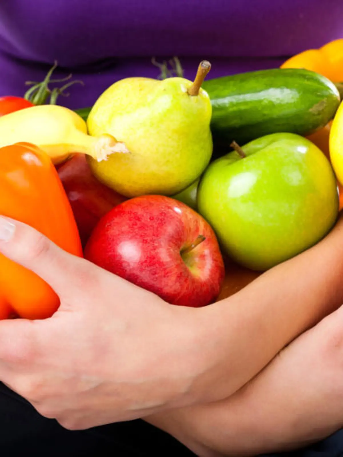 Healthy eating, happy woman with fruits and vegetables, closed-up