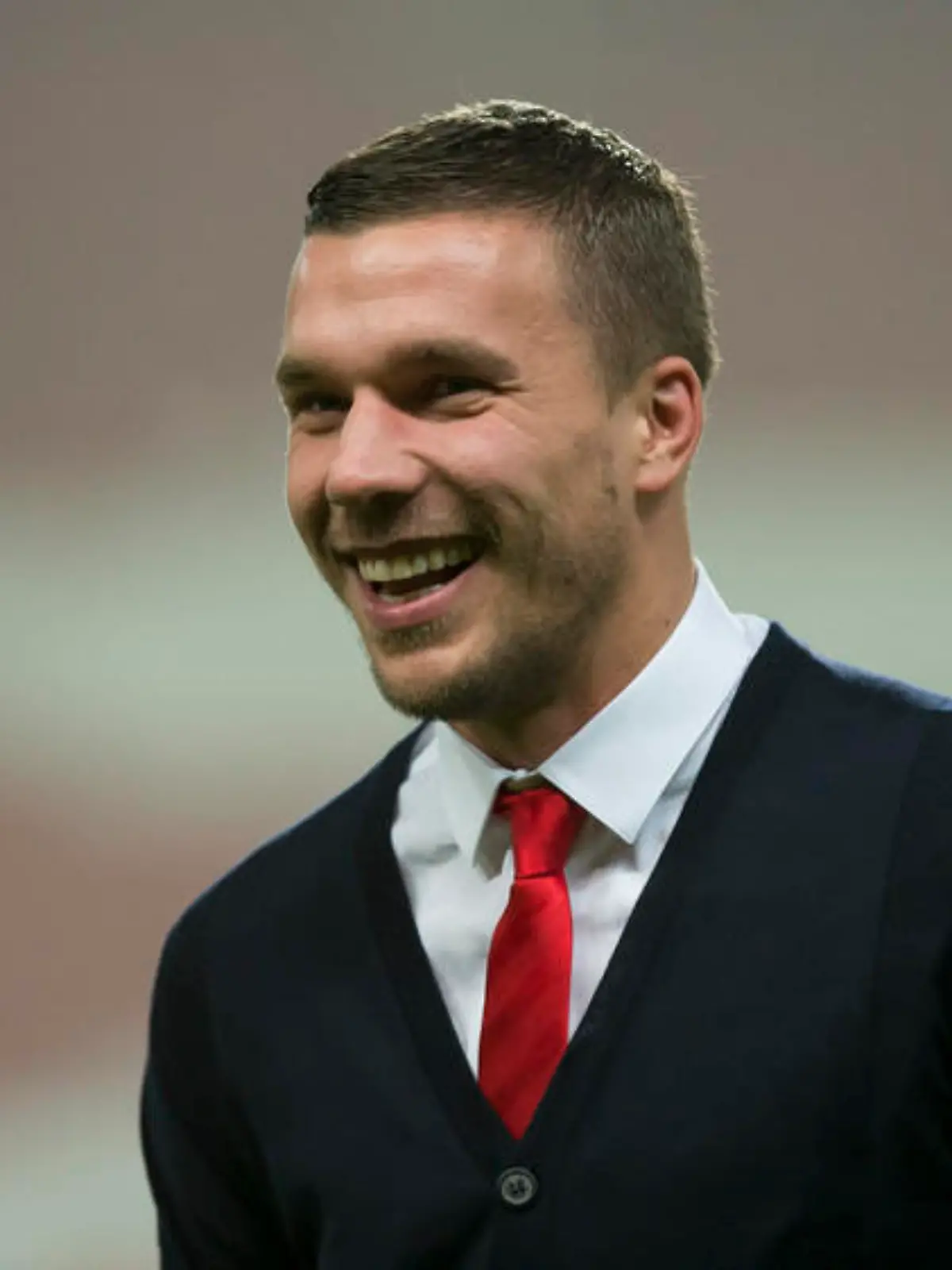 Da hat einer gut Lachen: Lukas Podolski wird zum zweiten Mal Vater