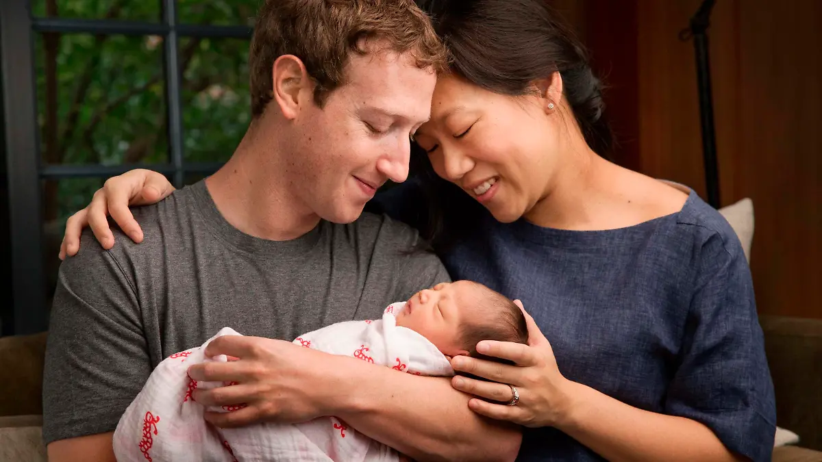 Facebook Inc. Chief Executive Mark Zuckerberg and his wife Priscilla are seen with their daughter named Max in this image released on December 1, 2015. Zuckerberg and his wife said they plan to give away 99 percent of their fortune in Facebook stock to a new charity the couple were creating, while announcing the birth of their first child on Tuesday. REUTERS/Courtesy of Mark Zuckerberg/Handout ATTENTION EDITORS - THIS PICTURE WAS PROVIDED BY A THIRD PARTY. REUTERS IS UNABLE TO INDEPENDENTLY VERIFY THE AUTHENTICITY, CONTENT, LOCATION OR DATE OF THIS IMAGE. EDITORIAL USE ONLY. NOT FOR SALE FOR MARKETING OR ADVERTISING CAMPAIGNS. NO RESALES. NO ARCHIVE. THIS PICTURE IS DISTRIBUTED EXACTLY AS RECEIVED BY REUTERS, AS A SERVICE TO CLIENTS TPX IMAGES OF THE DAY