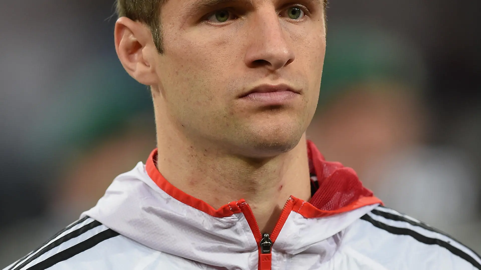 GELSENKIRCHEN, GERMANY - OCTOBER 14: Thomas Mueller of Germany looks on during the line-up for the EURO 2016 Group D qualifying match between Germany and Ireland at Veltins Arena on October 14, 2014 in Gelsenkirchen, Germany. (Photo by Matthias Hangst/Bongarts/Getty Images)