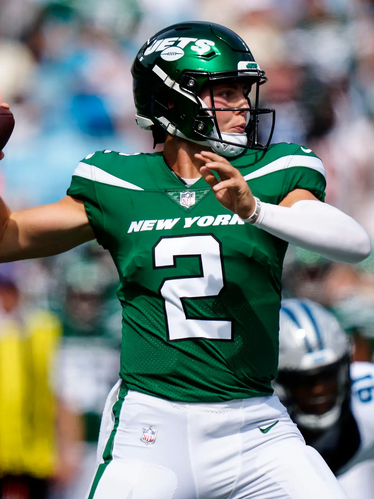 New York Jets quarterback Zach Wilson (2) passes in the pocket against the Carolina Panthers during the first half of an NFL preseason football game, Saturday, Aug. 12, 2023, in Charlotte, N.C. (AP Photo/Jacob Kupferman)