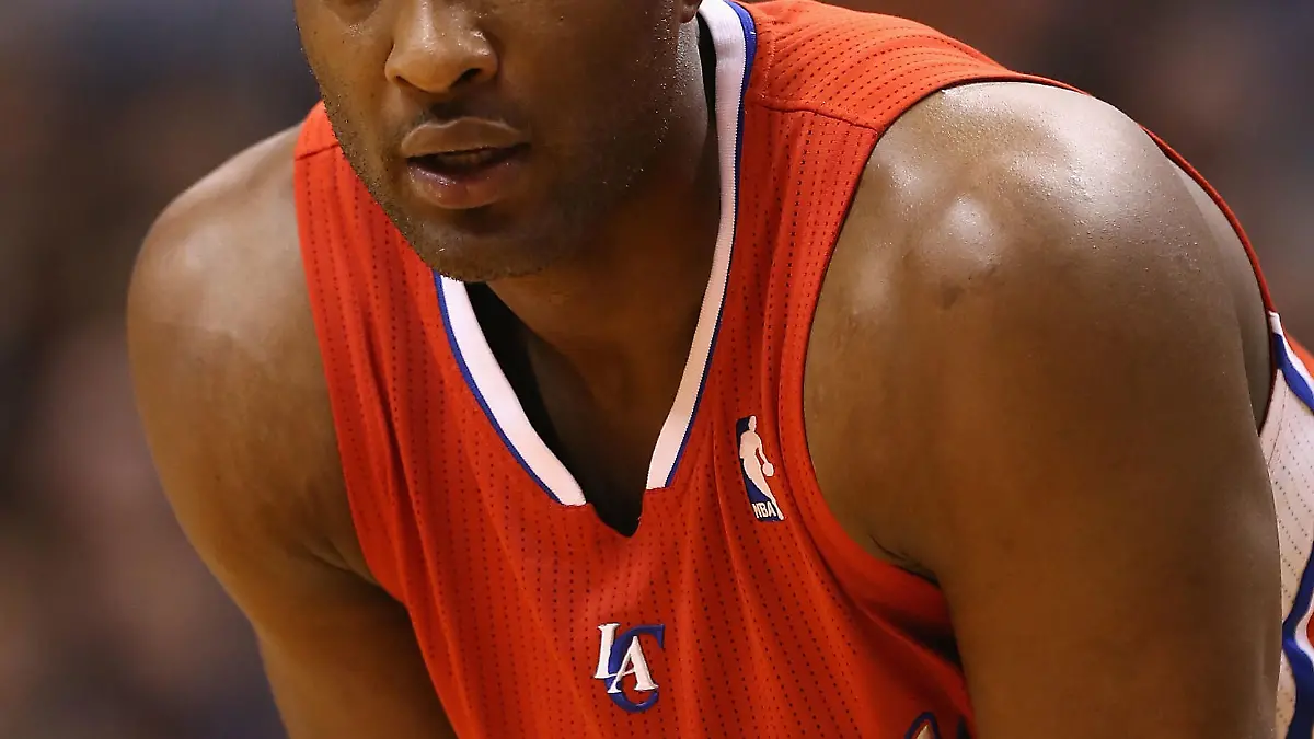 PHOENIX, AZ - JANUARY 24: Lamar Odom #7 of the Los Angeles Clippers during the NBA game against the Phoenix Suns at US Airways Center on January 24, 2013 in Phoenix, Arizona. The Suns defeated the Clippers 93-88. NOTE TO USER: User expressly acknowledges and agrees that, by downloading and or using this photograph, User is consenting to the terms and conditions of the Getty Images License Agreement. (Photo by Christian Petersen/Getty Images)