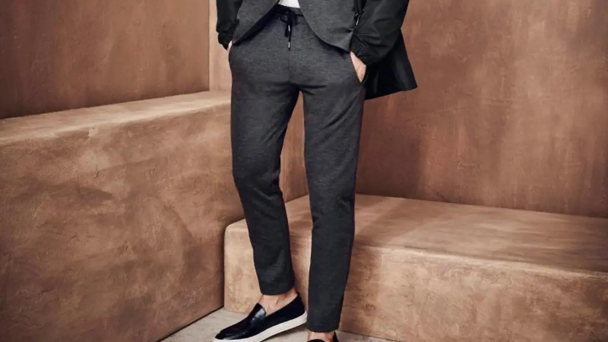 Mit dem passenden Sakko kann die Jogginghose auch stylish daherkommen - hier ein Beispiel von Cinque (Jacke ca. 250 Euro, Sakko ca. 230 Euro, Shirt ca. 50 Euro, Hose ca. 100 Euro). Foto: Cinque