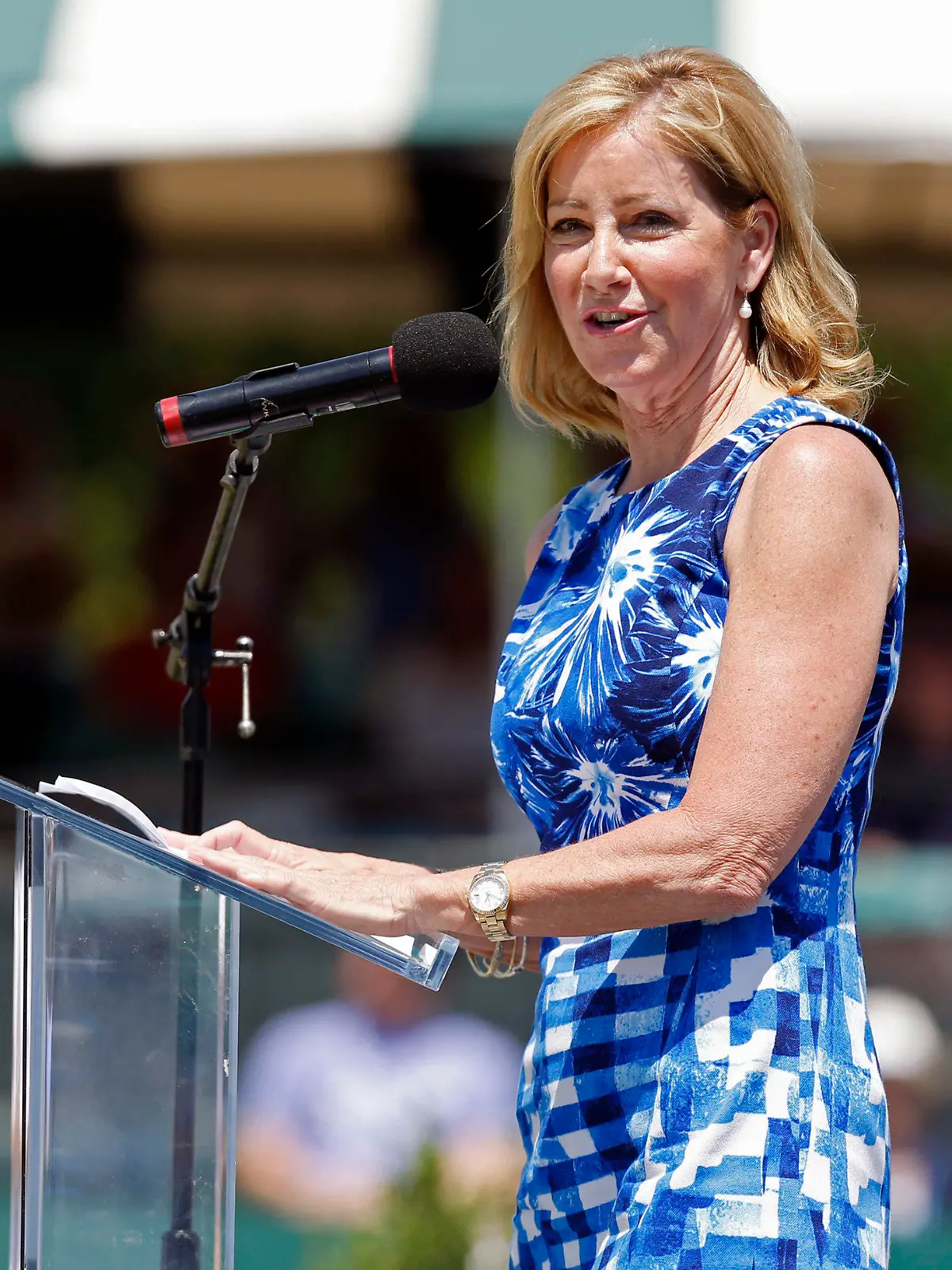 FILE -Chris Evert speaks during the induction ceremony at the International Tennis Hall of Fame in Newport, R.I., Saturday, July 12, 2014. Former tennis star Chris Evert says she was diagnosed with an early stage of ovarian cancer. The 67-year-old Evert revealed the illness in a story posted Friday, Jan. 14, 2022 on ESPN.com. (AP Photo/Michael Dwyer, File)