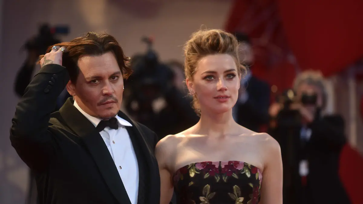 72th Venice international film festival. Premier The Danish Girl. Amber Heard, Tom Hooper, Alicia Vikander, Eddie Redmayne and Matthias Schoenaerts. Guest Johnny Depp.
�M.Angeles Salvador/Nordestfoto/Splash
<P>
Pictured: Johnny Depp and Amber Heard
<B>Ref: SPL1117591  050915  </B><BR/>
Picture by: NORDESTFOTO / Splash News<BR/>
</P><P>
<B>Splash News and Pictures</B><BR/>
Los Angeles:	310-821-2666<BR/>
New York:	212-619-2666<BR/>
London:	870-934-2666<BR/>
photodesk@splashnews.com<BR/>
</P>