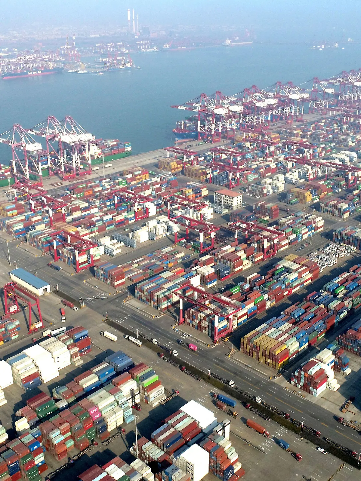 QINGDAO, CHINA - JANUARY 2, 2023 - Aerial photos are taken at Qingdao Port in east China's Shandong Province, Jan 2, 2023. In 2022, Shandong ports added 37 new sea routes, bringing the total number of routes to 327, among which 233 are foreign trade routes.